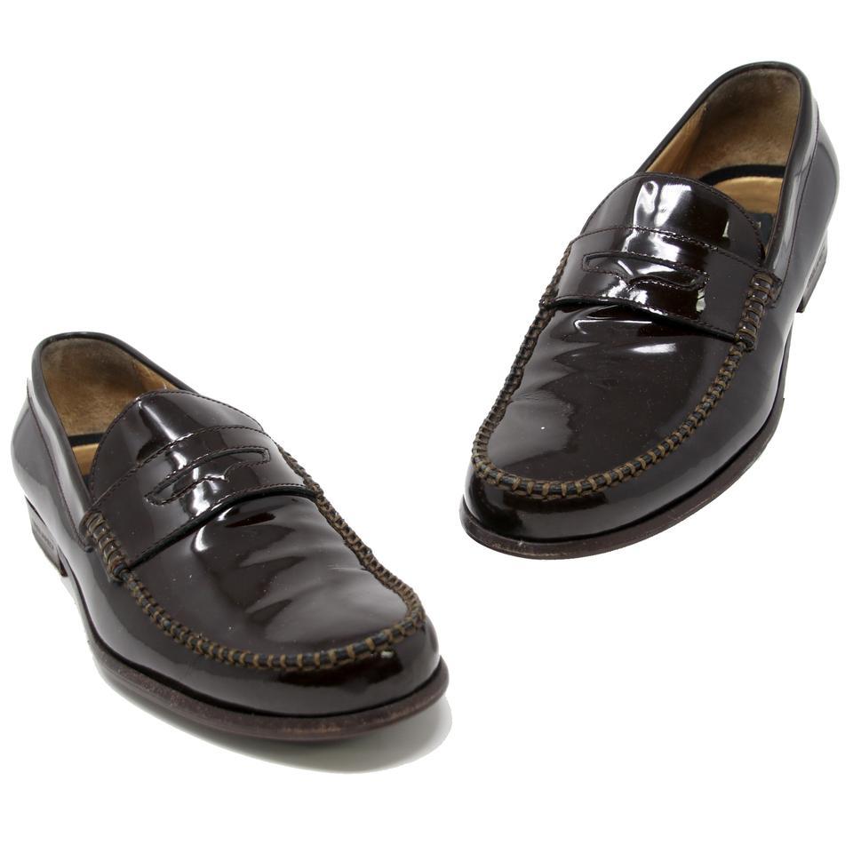 Dsquared2 Brown Patent Leather Round-Toe Stitching Penny Loafers Formal Shoes

Dsquared2 Loafers consists of patent leather material in a brown color tone. Designed in a round-toe front, pipping along top surface with tone-on-tone stitching