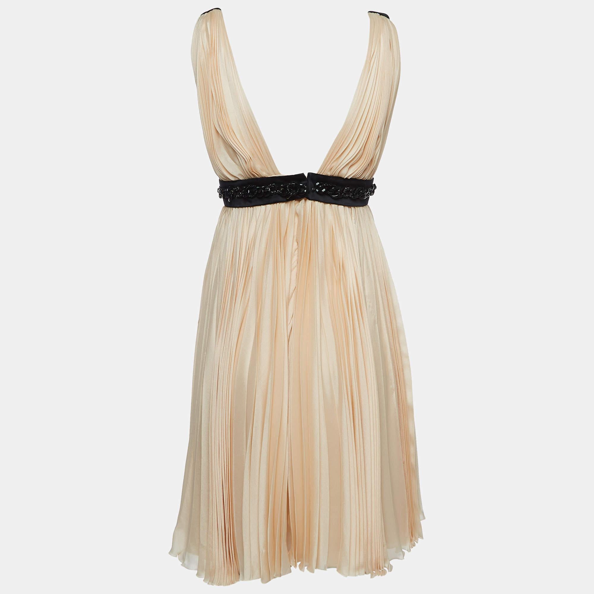Experience the joy of expert tailoring with this designer dress for women. Meticulously made it offers a flawless fit and luxe details ensuring unmatched comfort. Its classic design makes it suitable for any occasion elevating your style