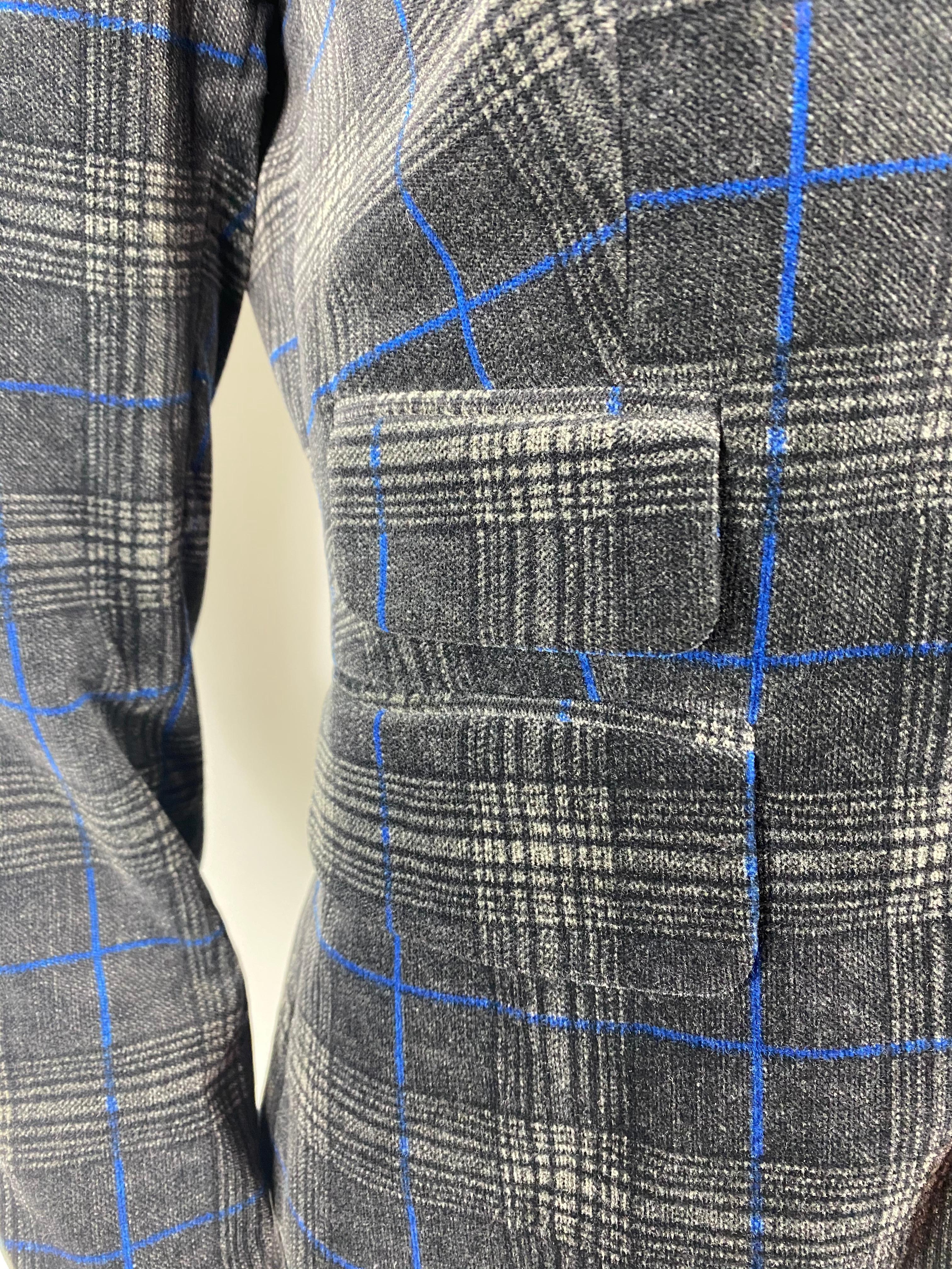 Product details:

Featuring grey and blue check and plaid pattern in velvet finish with collar, front button closure and front pockets design detail. Made in Italy.