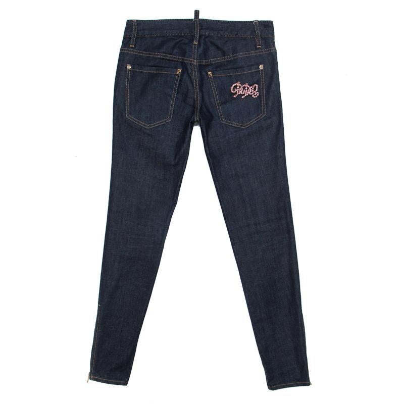 Tailored using a quality cotton blend, this pair of jeans from Dsquared2 will give you a wonderful fitting. The indigo jeans are styled with pockets, zip-detailed tapered legs and a pretty crystal-embellished badge detail at the back. Complete your