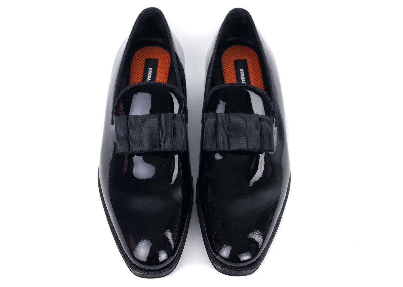 
DSquared2 black patent leather tuxedo loafers for those extra special occasions. Dsquared2 takes on a classic pair of tuxedo loafers that are traditional and worn for special events. Very sophisticated and fitting to pair with an all black tuxedo