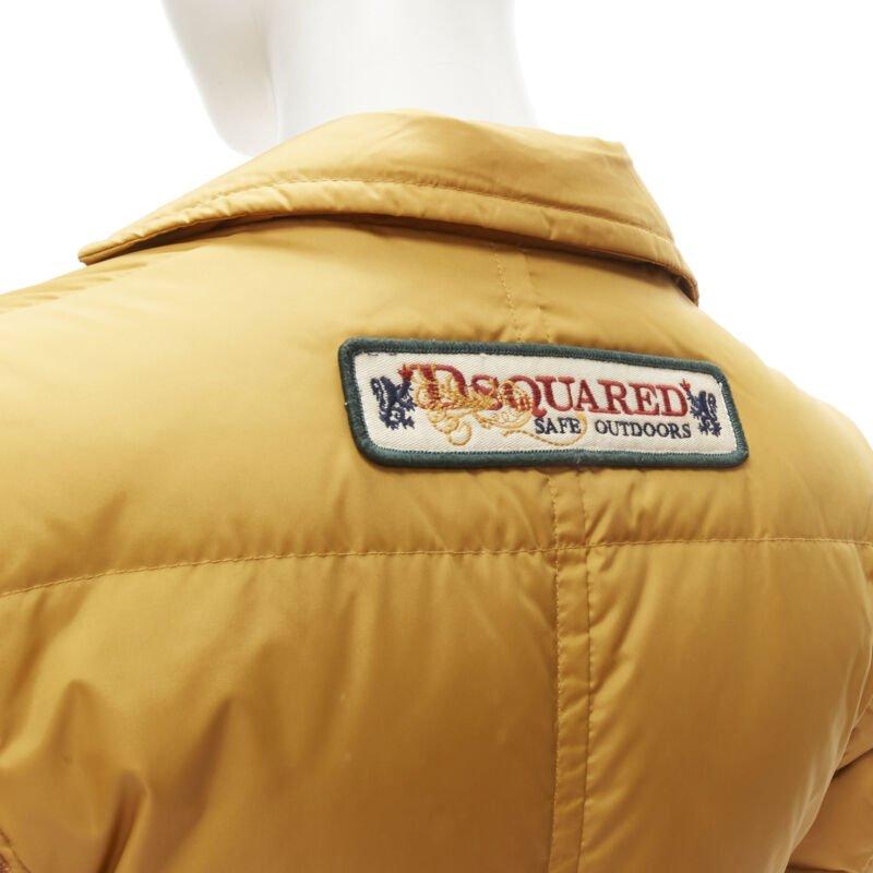 DSQUARED2 mustard white goose down padded 3-pocket blazer jacket IT38 XS
Reference: ANWU/A00762
Brand: Dsquared2
Material: Nylon
Color: Yellow
Pattern: Solid
Closure: Zip
Lining:  Down
Extra Details: Concealed zip snap button closure. Metal piped