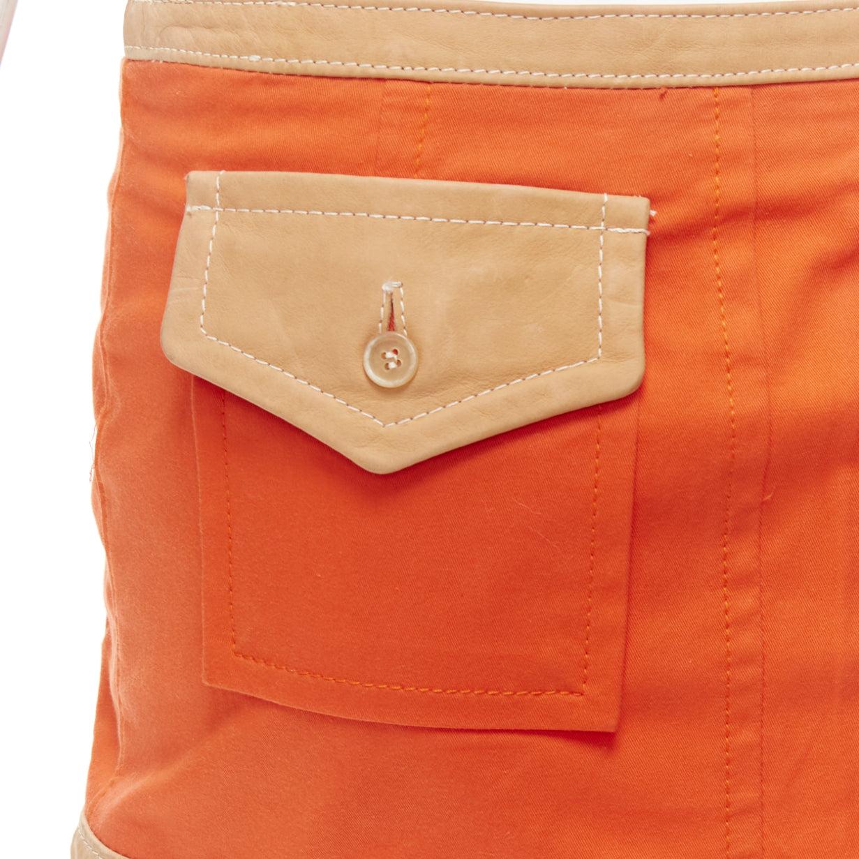 DSQUARED2 orange beige canvas leather zip front pocket mini skirt IT38 XS
Reference: ANWU/A01174
Brand: Dsquared2
Material: Leather, Canvas
Color: Orange, Beige
Pattern: Solid
Closure: Zip
Lining: White Fabric
Extra Details: Leather flap pockets