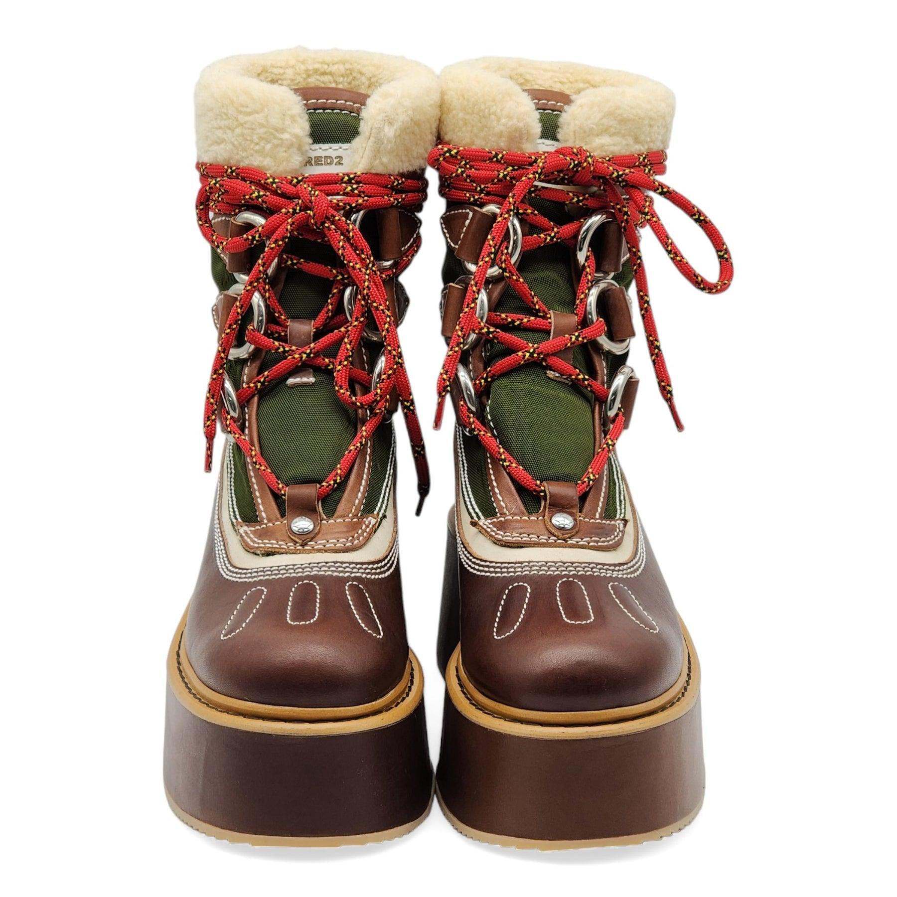 Composition : Cuir bovin, peau de mouton, shearling. Logo de la marque sur la languette.


Informations complémentaires :
Couleur : marron
Taille : 8 US
Pays : Italie
Dimension : Plate-forme : 3.15