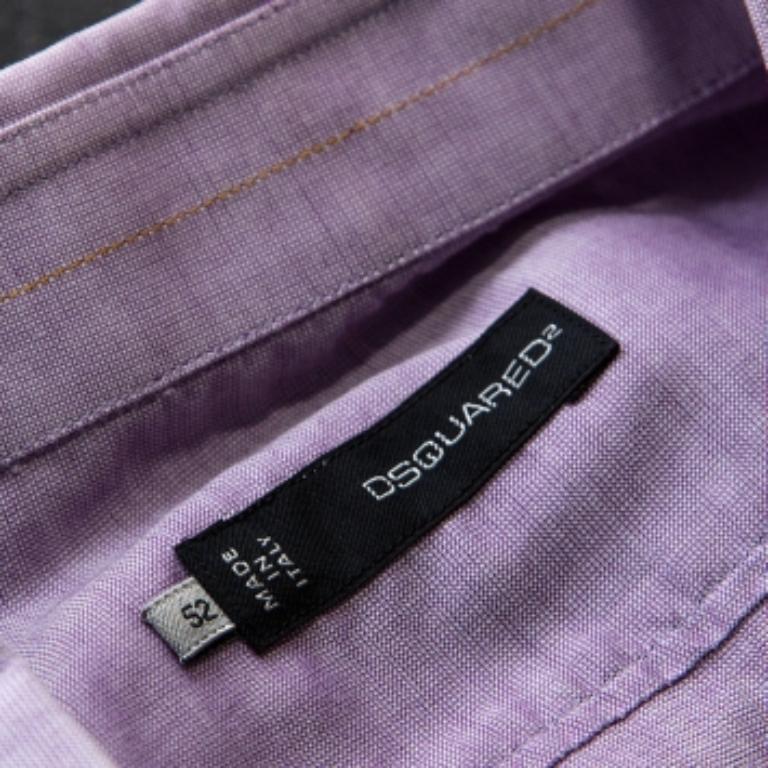 This lovely chambray shirt from Dsquared2 is a great option for formal occasions. Crafted from 100% cotton, it comes in a lovely shade of purple. It is styled with a simple collar, cuffed long sleeves, button front and has been cut to offer a good