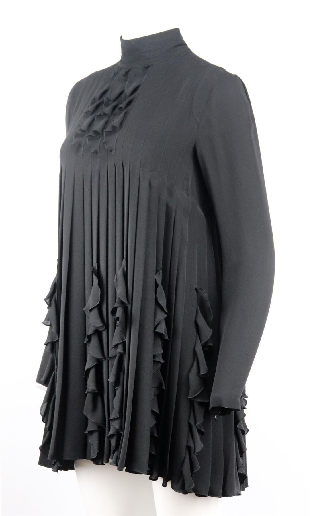 This dress by DSquared2 is cut from silk in a babydoll shape complete with a high-neck collar, pintucked yoke and ruffle trim with slightly puffed sleeves. Black silk. Concealed zip fastening at back. 100% Silk. Size: IT 44 (UK 12, US 8, FR 40).