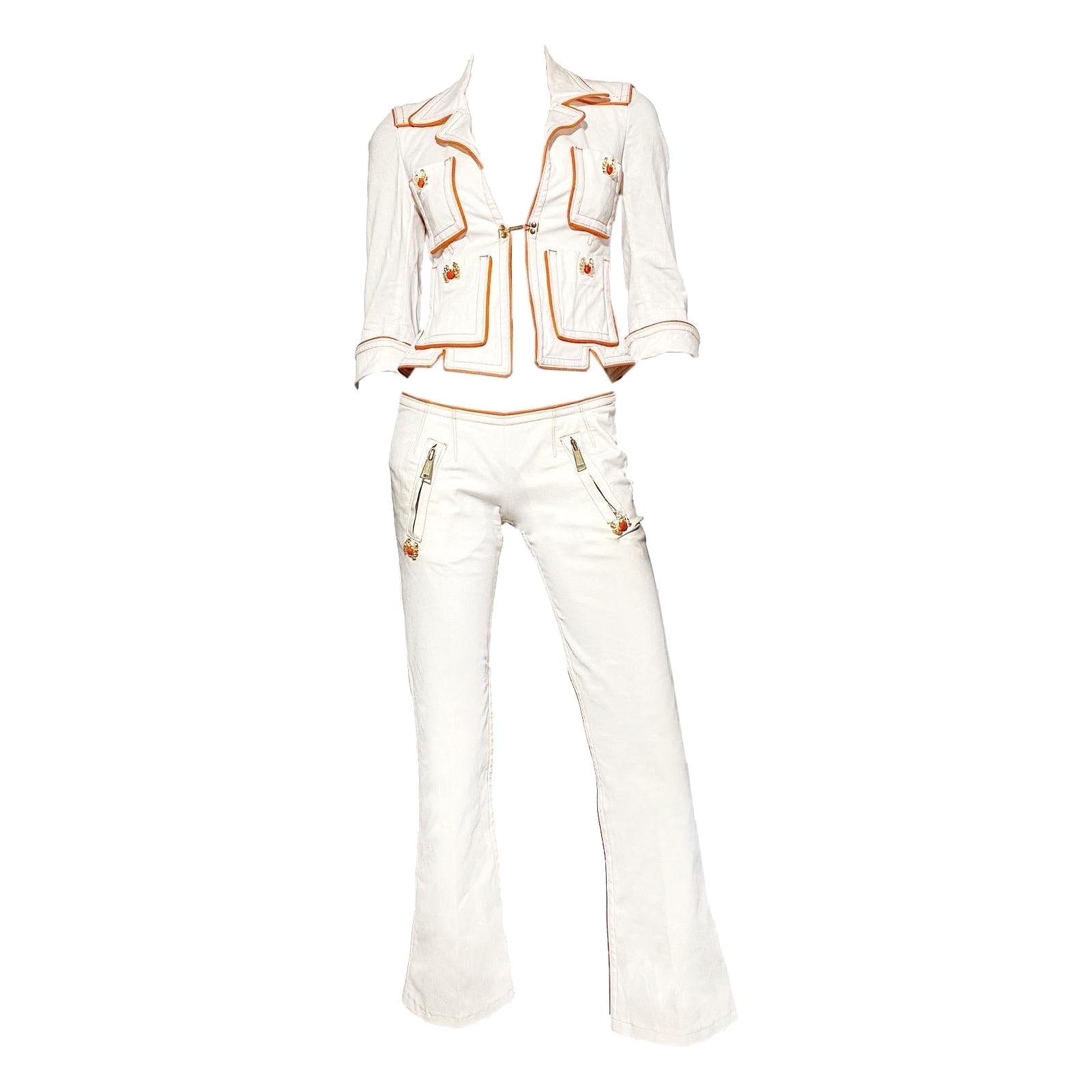 Dsquared2 Spring/Summer 2005 sailor-style white cotton suit (jacket + pants) with orange detailing and gold crabs appliques with swarovskis allover. Cropped jacket with mid length sleeves and hook closure, low-rise pants with back zipper and
