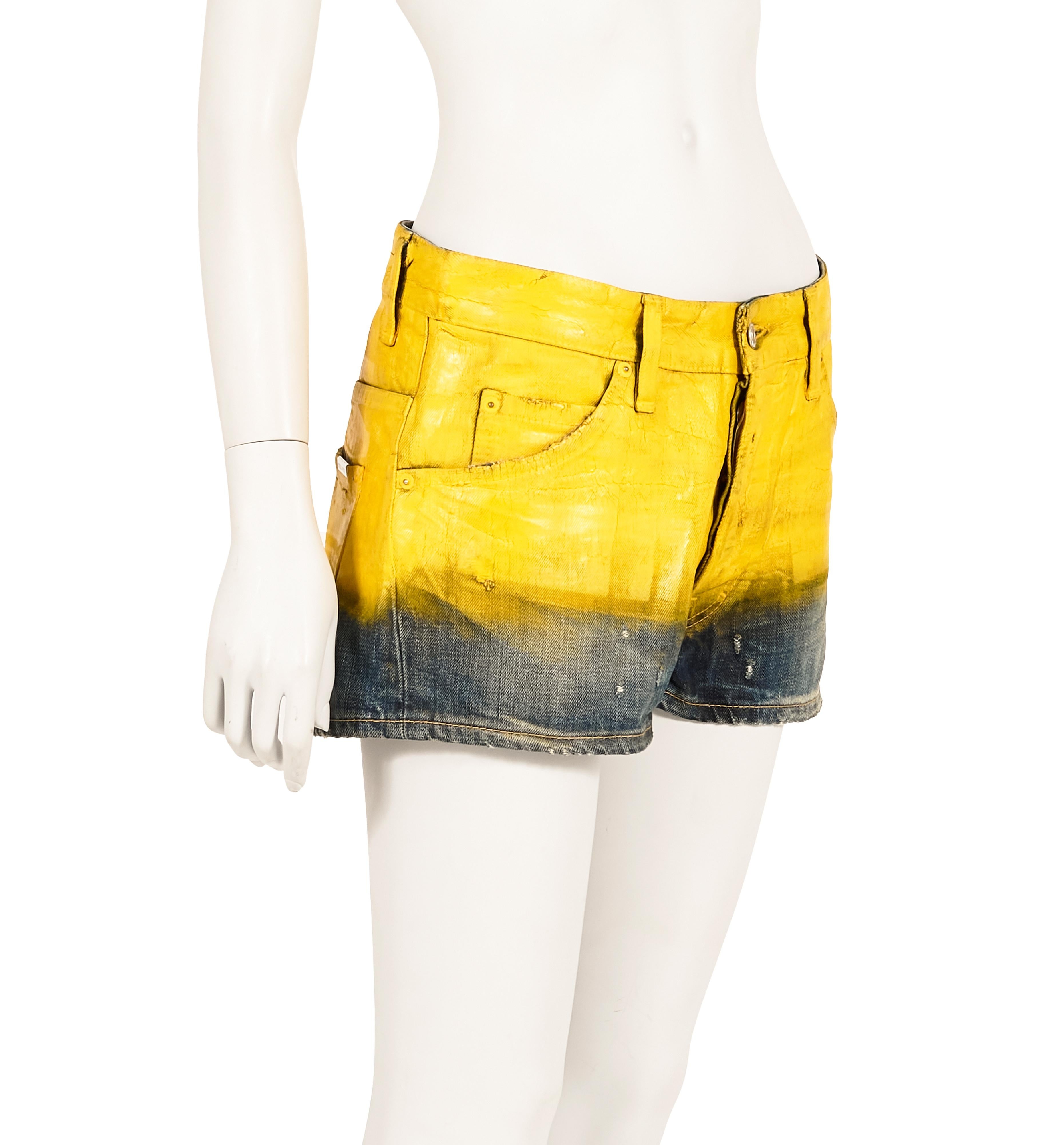 - Dsquared2 Spring Summer 2010 collection
- Sold by Gold Palms Vintage 
- Low rise dark-wash denim shorts
- Yellow varnish paint coat
- Size: IT 40 

Measurements (laid flat)

Waist: 37,5 cm / 14.7 inch
Length: 28 cm / 11 inch