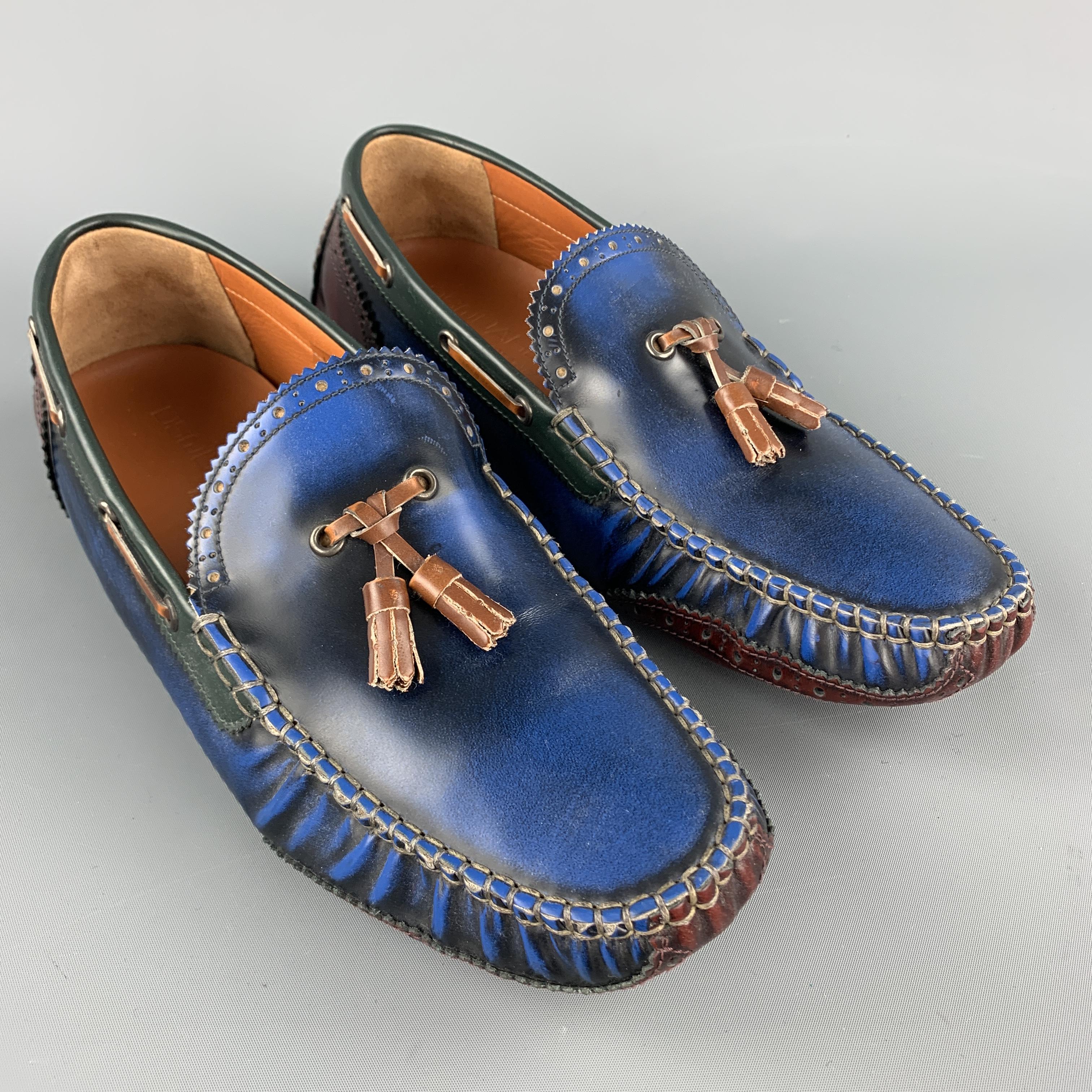 DSQUARED2 loafers come in antique effect blue leather with brown woven tassels, brown panels, and driver sole. Made in Italy.

Excellent Pre-Owned Condition.
Marked: IT 43

Outsole: 11.5 x 4 in.