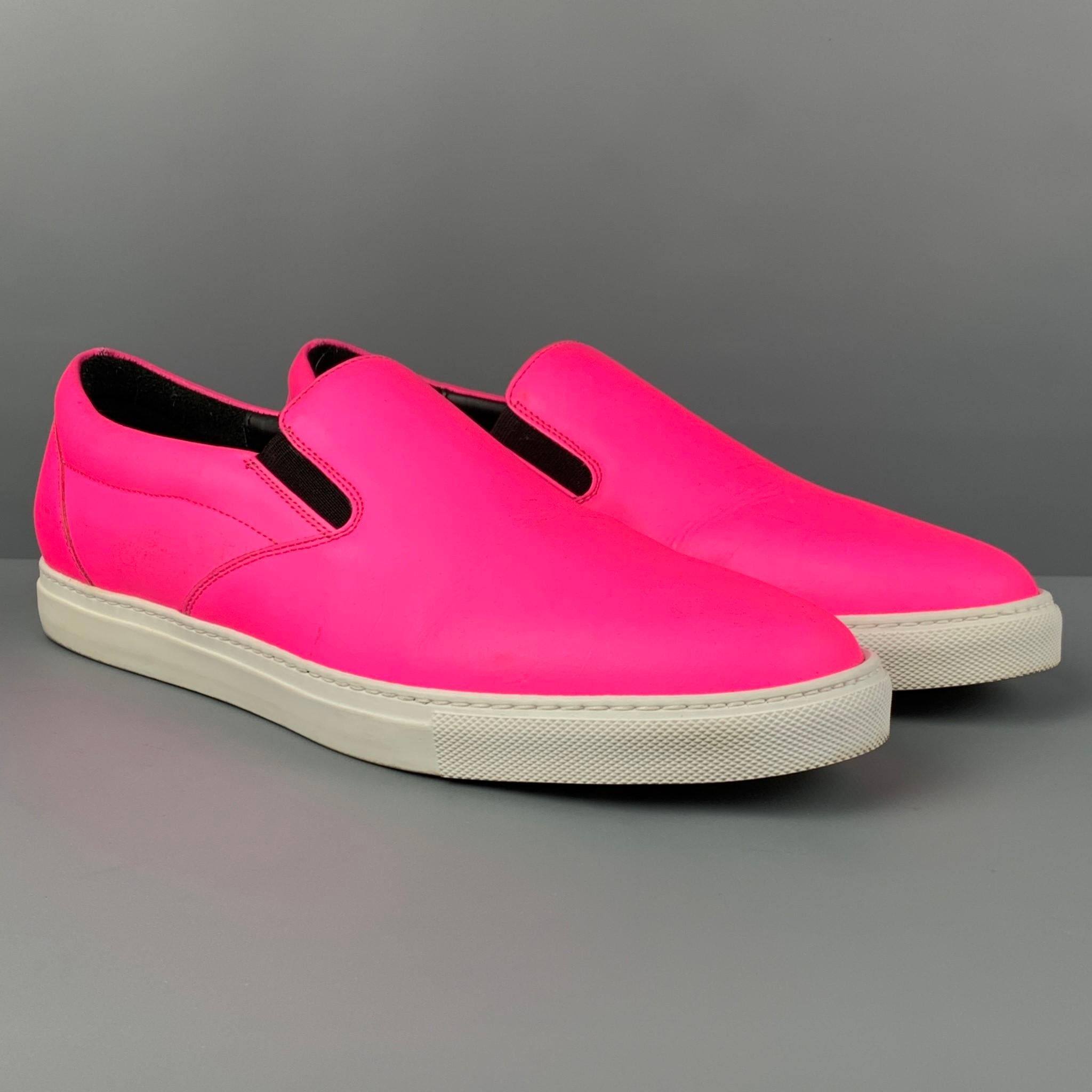 DSQUARED2 shoes comes in a neon pink nylon featuring a slip on style and a rubber sole. Made in Italy. 

Good Pre-Owned Condition. Moderate wear. As-Is.
Marked: 43

Outsole: 11.75 in. x 4 in. 