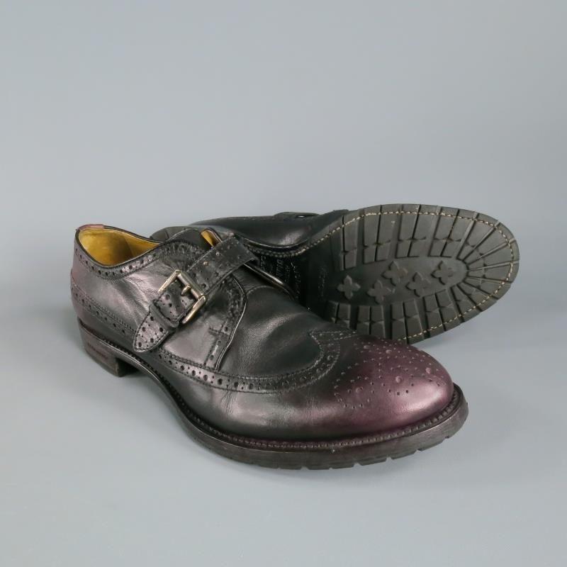 Unique monkstrap dress/casual wingtip shoes by DSQUARED2.  Subtle hombre front and back in eggplant tones.  Wooden stack heel with DSquared2 engraving, Vibram rubber commando sole.  Made in Italy.

Excellent Pre-Owned Condition.

Marked : IT