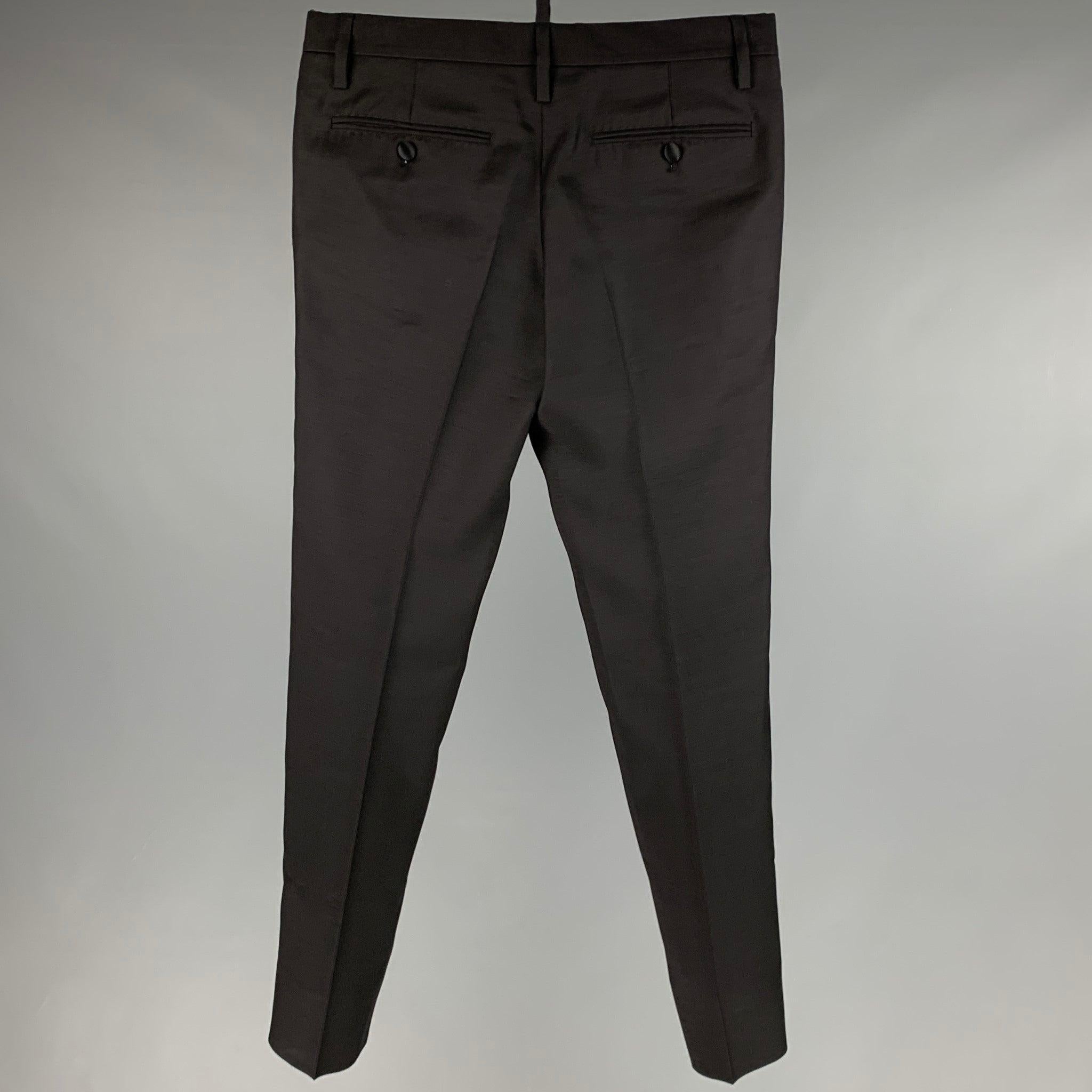 DSQUARED2 dress pants
in a black silk fabric featuring tuxedo stripes, and button fly closure. Made in Italy.Excellent Pre-Owned Condition. 

Marked:  44 

Measurements: 
 Waist: 28 inches Rise: 7 inches Inseam: 30 inches Leg Opening: 13 inches 
 
