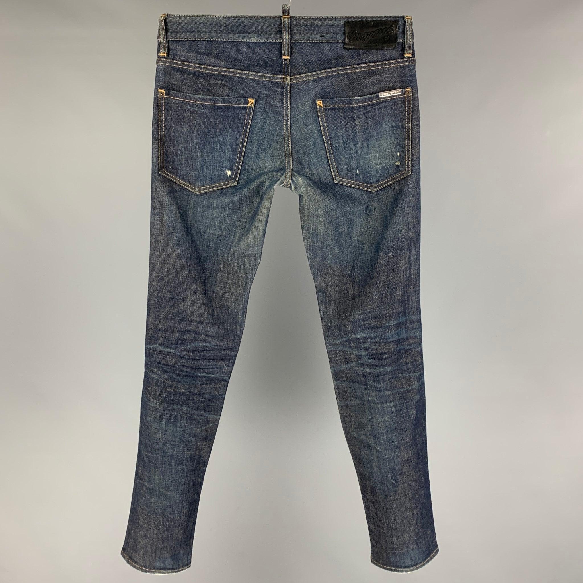 DSQUARED2 jeans comes in a indigo cotton featuring a skinny fit, contrast stitching, and a button fly closure. Made in Italy.
Very Good
Pre-Owned Condition. 

Marked:   46 

Measurements: 
  Waist: 32 inches  Rise: 8.5 inches  Inseam: 32 inches 
  
