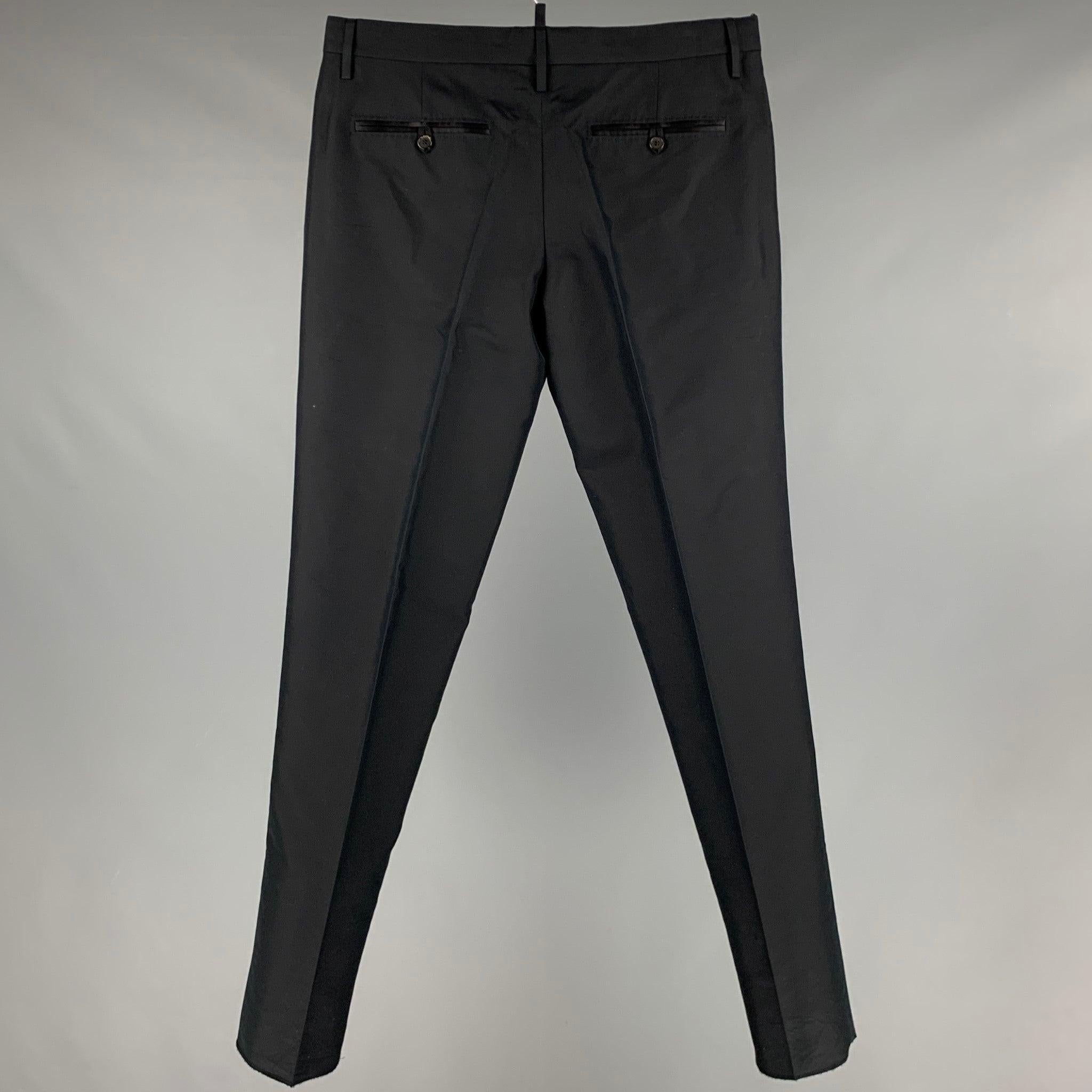 DSQUARED2 dress pants
in a black cotton silk blend fabric featuring tuxedo stripes and button fly closure. Made in Italy.New With Tags. Minor mark on left backside. 

Marked:   48 

Measurements: 
  Waist: 32 inches Rise: 8 inches Inseam: 34 inches