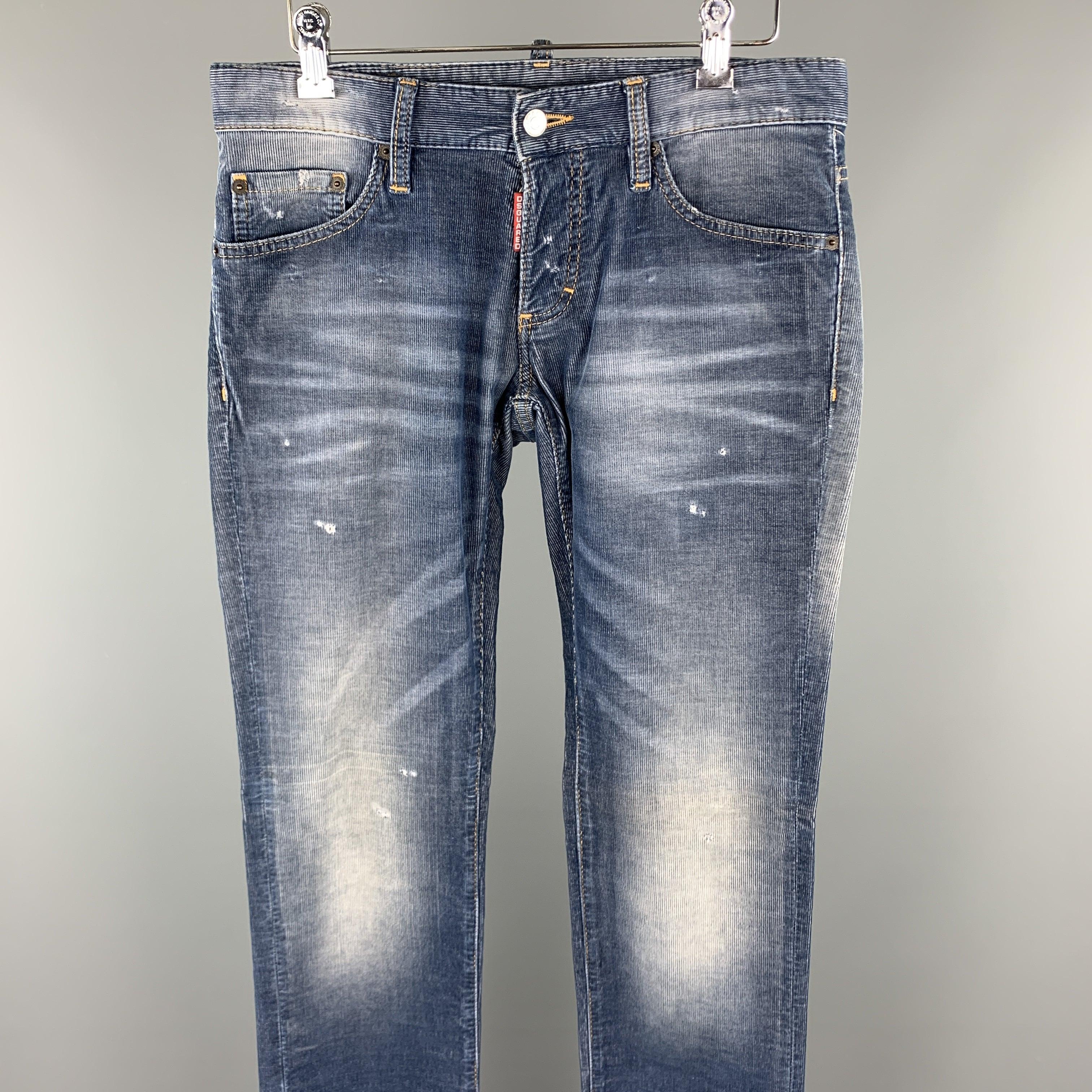 DSQUARED2 casual pants comes in a blue washed corduroy featuring a denim effect, contrast stitching, distressed details, and a button fly closure. Made in Italy.
Excellent
Pre-Owned Condition. 

Marked:   IT 44 

Measurements: 
  Waist: 32 inches