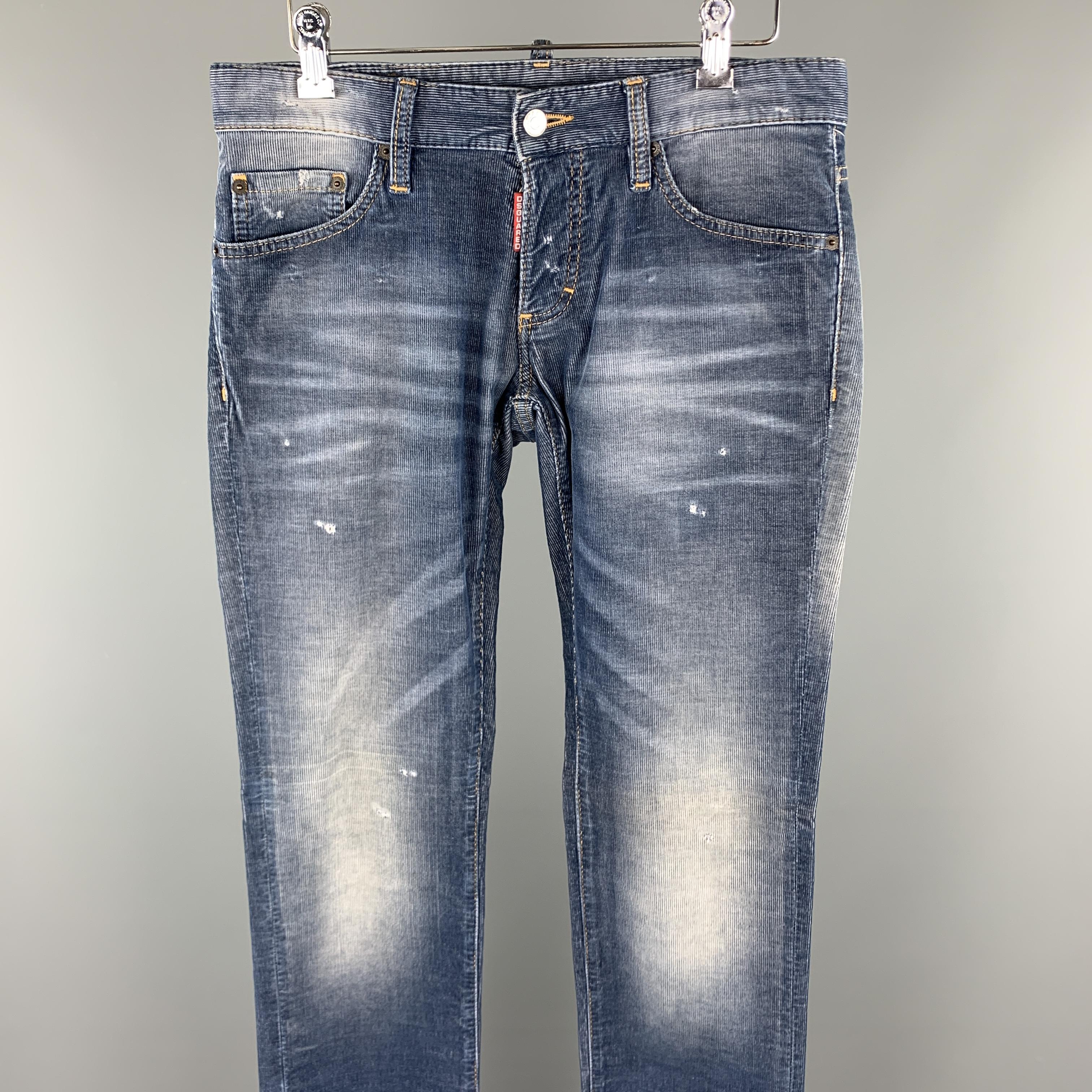 DSQUARED2 casual pants comes in a blue washed corduroy featuring a denim effect, contrast stitching, distressed details, and a button fly closure. Made in Italy.

Excellent Pre-Owned Condition.
Marked: IT 44

Measurements:

Waist: 32 in.
Rise: 7 in.