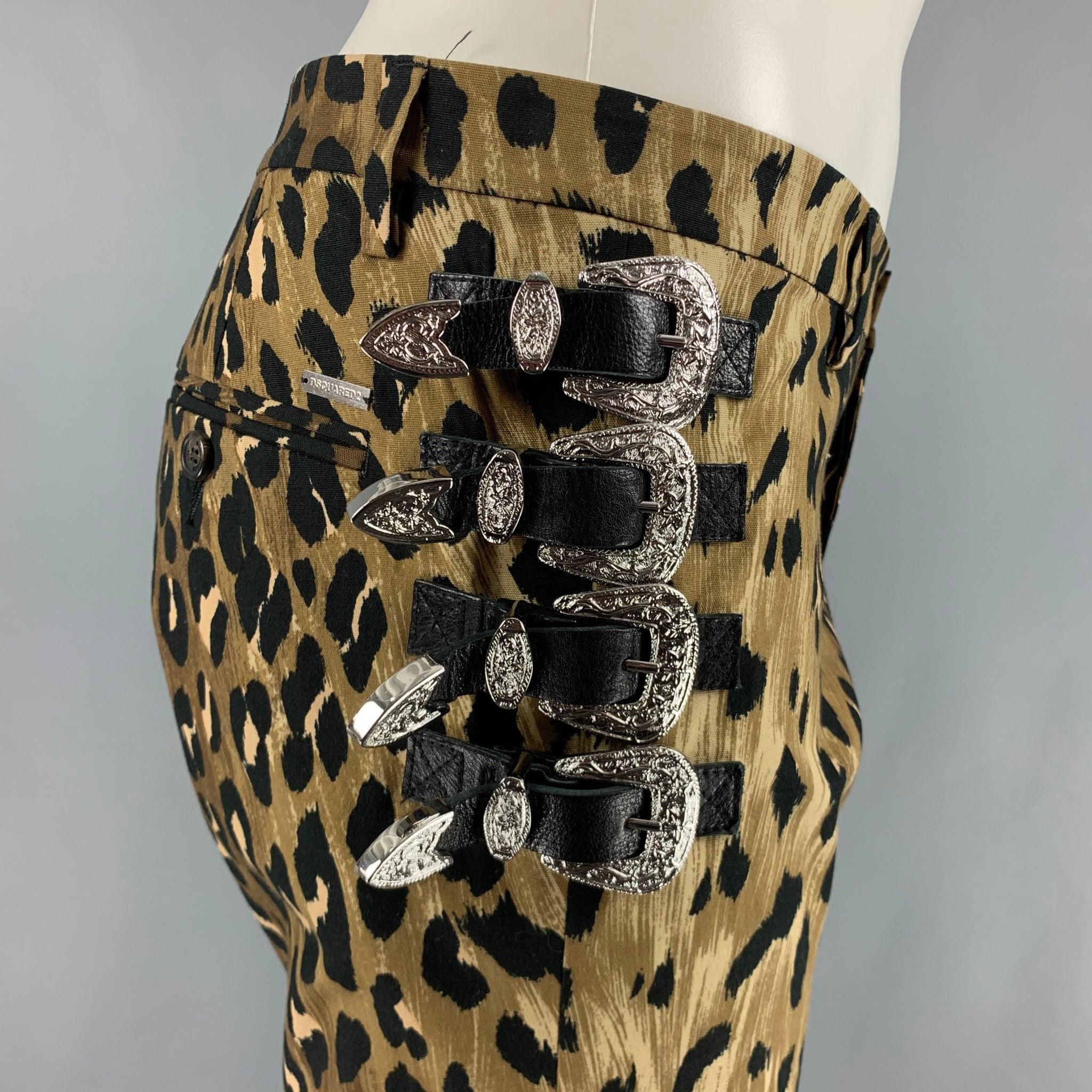 DSQUARED2 dress pants comes in a brown and black animal print woven material featuring a multi buckles at sides, slim fit, flat front, and a button fly closure. Made in Italy. Excellent Pre-Owned Condition. 

Marked:   48 

Measurements: 
  Waist: