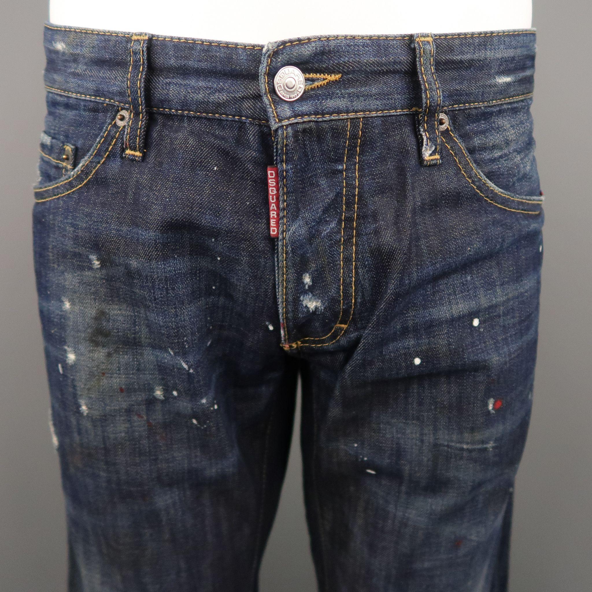 DSQUARED2 Jeans comes in a indigo tone in a denim material, with intentional ink stains throughout and distressed, with a button fly and embroideries at back pockets. Made in Italy.
 
Excellent Pre-Owned Condition.
Marked: 50 IT
 
Measurements:
