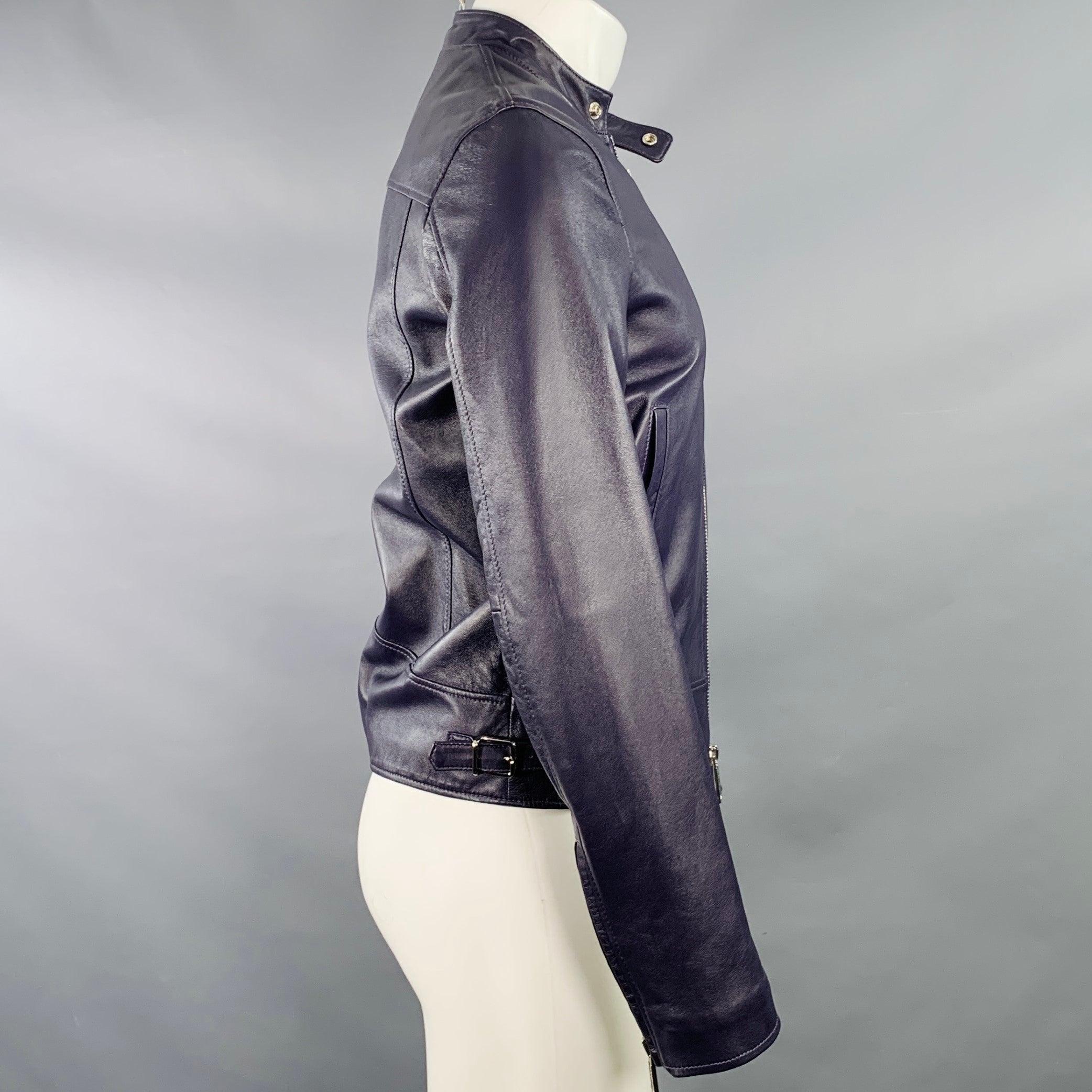 DSQUARED2 jacket
in a purple leather featuring a motorcycle style, two snap pockets, and zip up closure. Made in Romania.Excellent Pre-Owned Condition. 

Marked:   IT 46 

Measurements: 
 
Shoulder: 15.5 inches Chest: 39 inches Sleeve: 25 inches