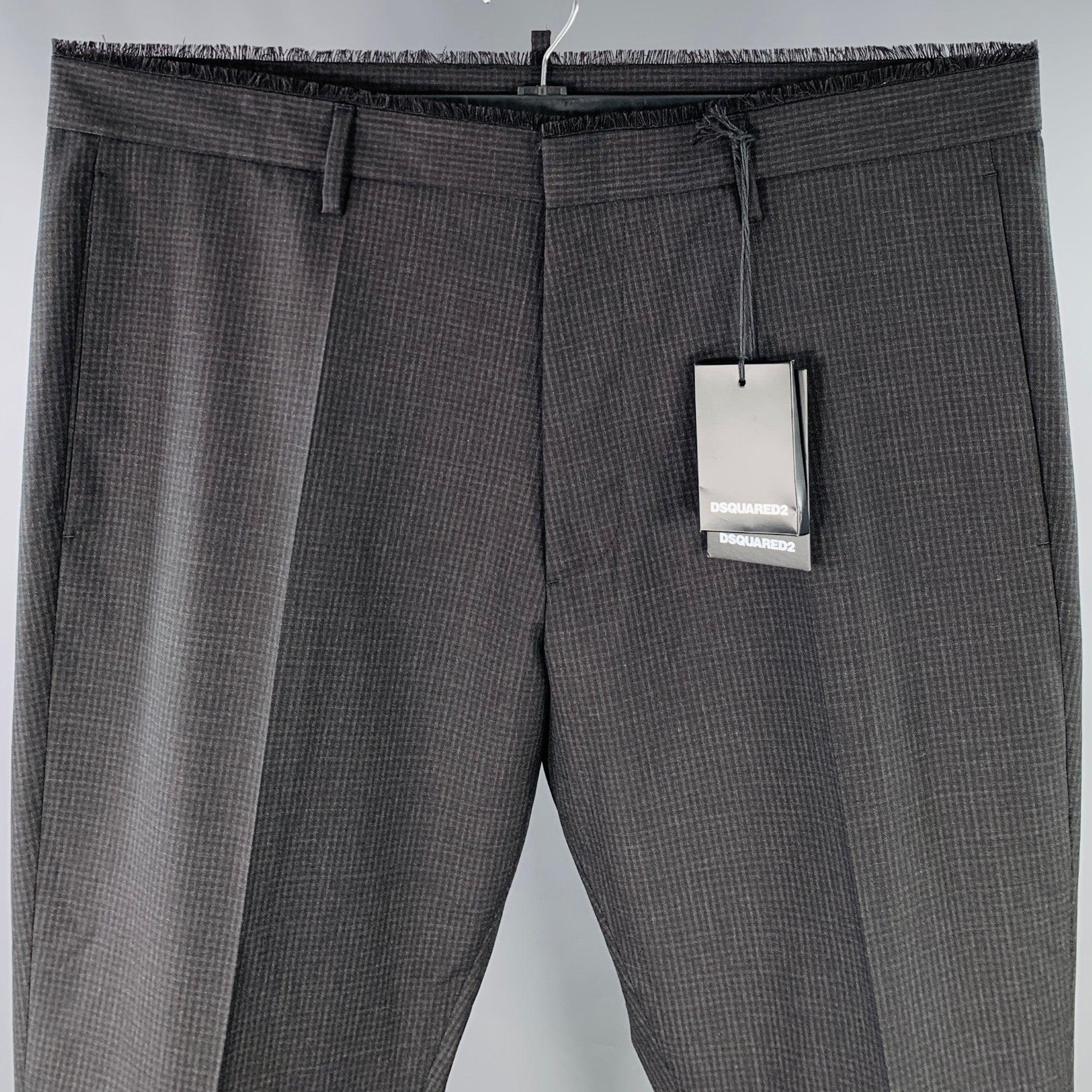 DSQUARED2 pantalones de vestir
de lana gris y negra con estampado de cuadros, cintura con bordes sin rematar y bragueta de botones. El dobladillo se ha dejado sin rematar para poder adaptarlo a tu medida perfecta. Nuevo con etiquetas. 

Marcado:  