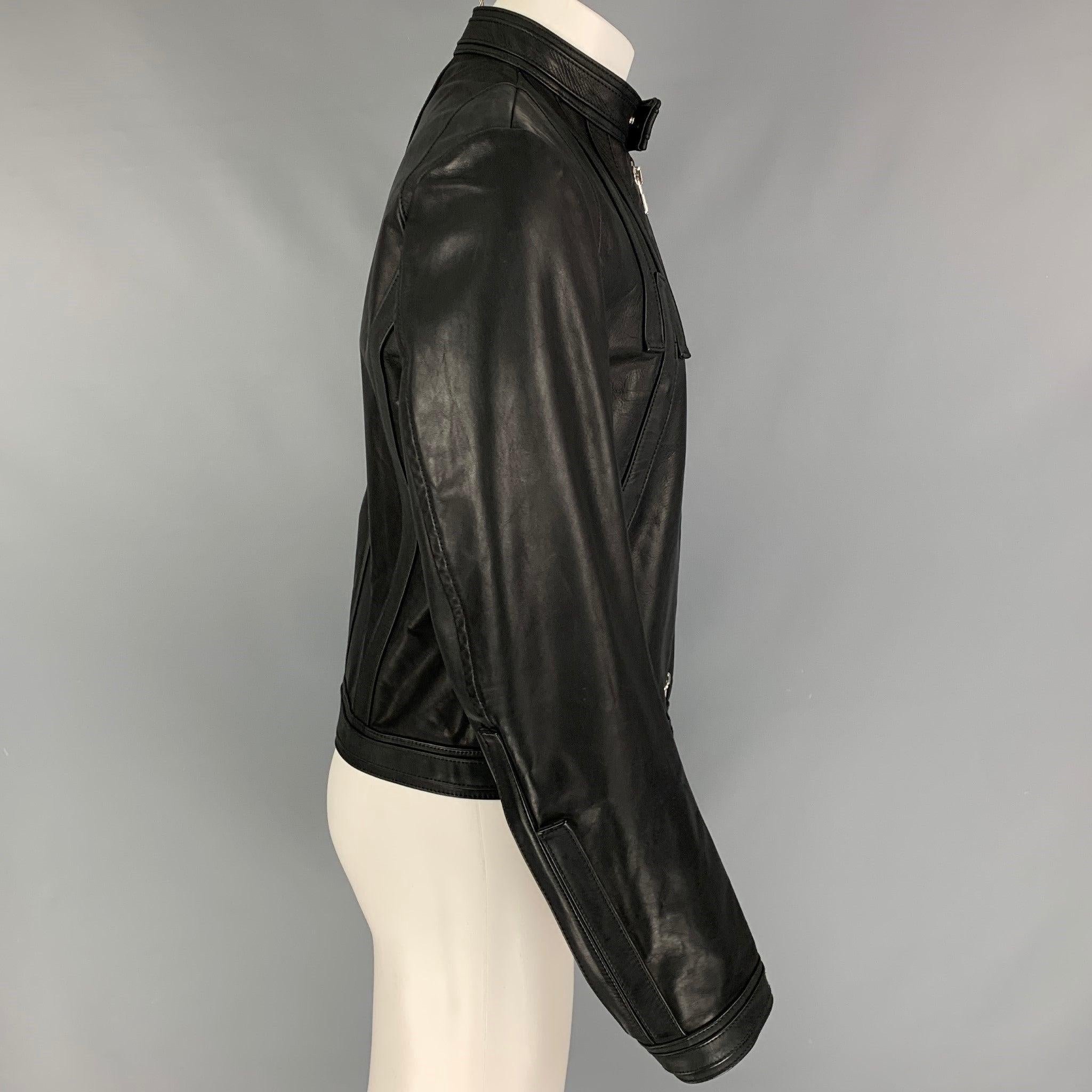 DSQUARED2 jacket comes in a black leather with a full liner featuring a motorcycle style, front stripe details, front zipper pockets, zipped sleeves, and a full zip up closure. Made in Italy.
Excellent
Pre-Owned Condition. 

Marked:   50