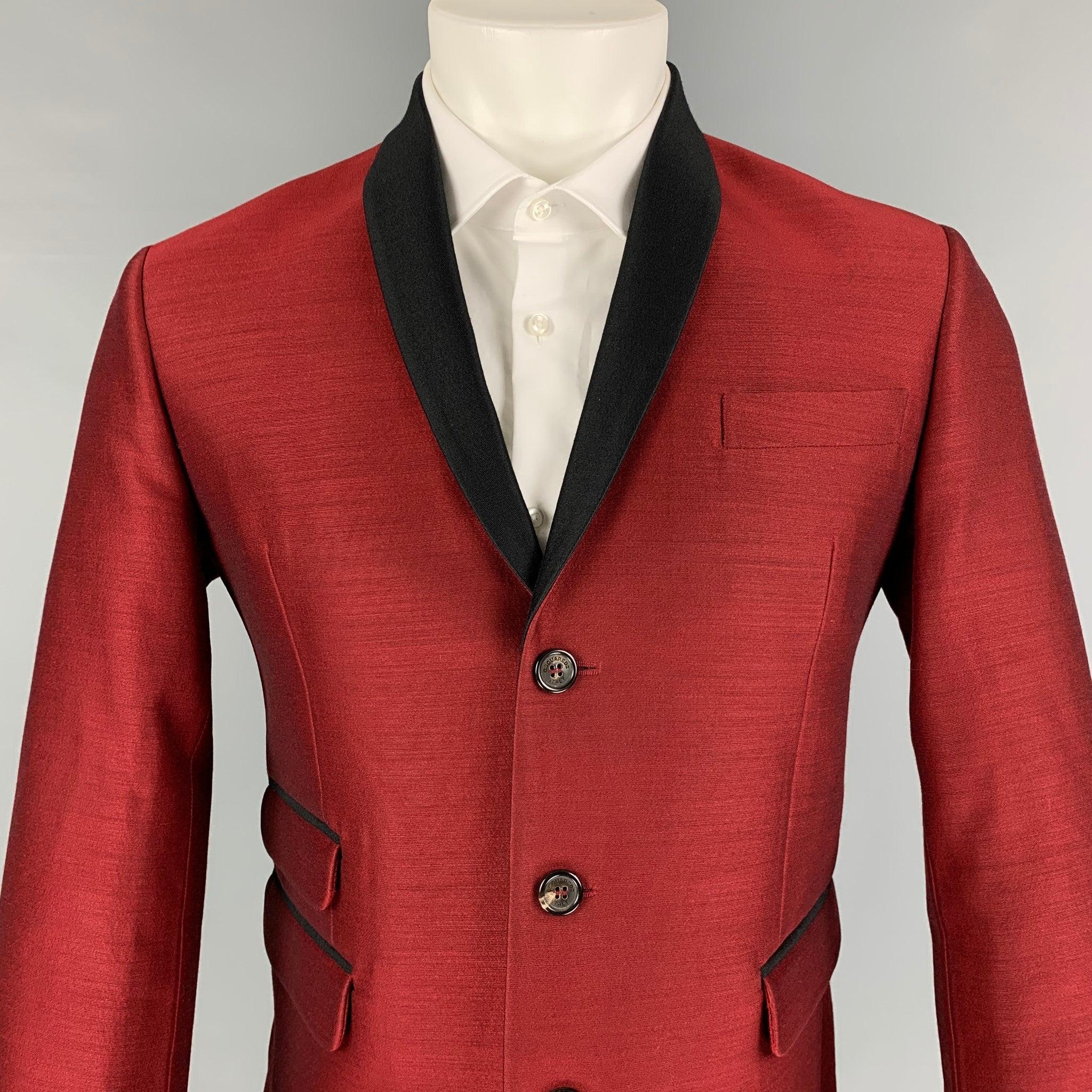 DSQUARED2 sport coat comes in a burgundy & black wool / silk with a full liner featuring a shawl collar, flap pockets, double back vent, and a three button closure. Made in Italy.Very Good
Pre-Owned Condition. 

Marked:   50 

Measurements: 
