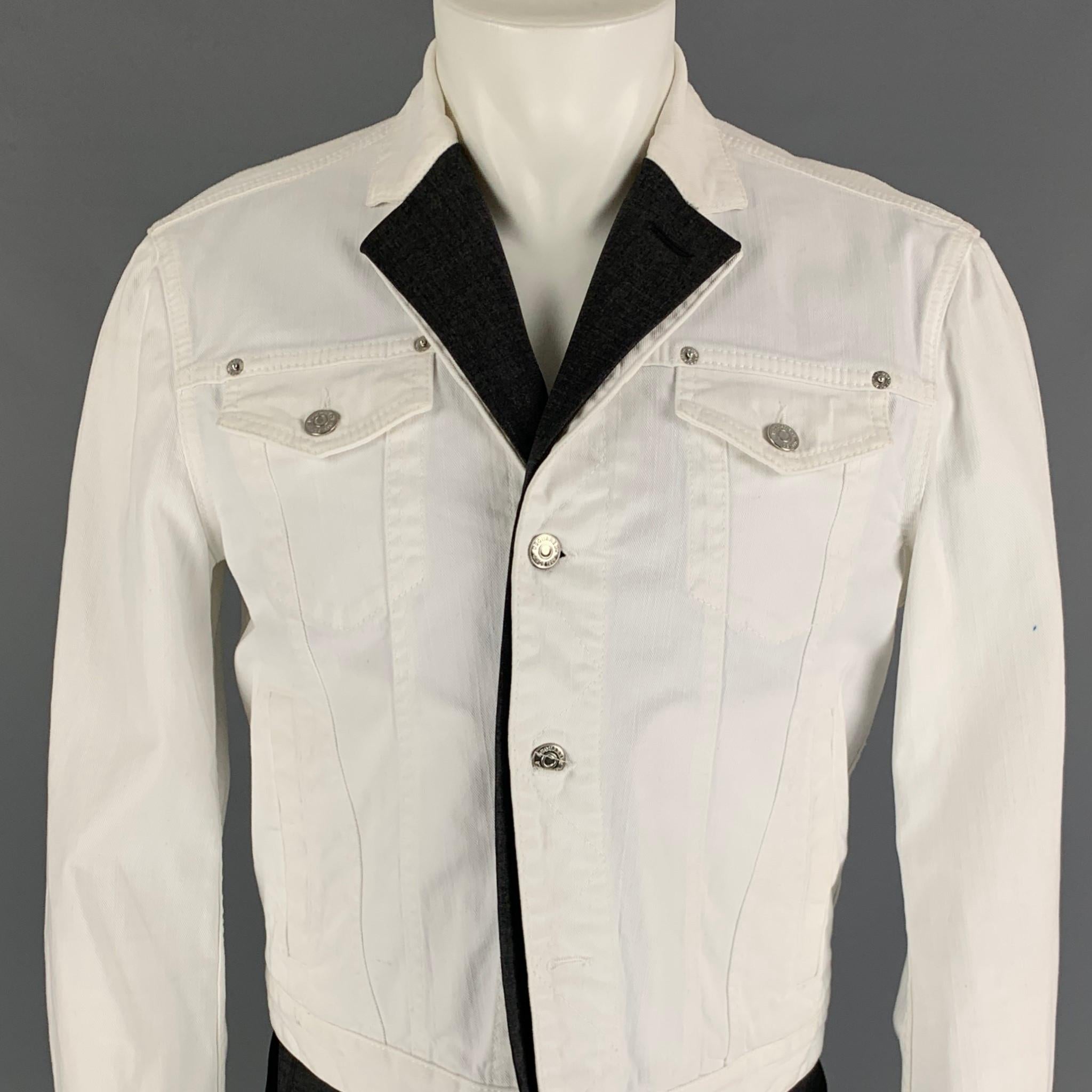 DSQUARED2 jacket comes in a white & grey cotton with a wool blend vest layer featuring a trucker style, notch lapel, front pockets, and a buttoned closure. Made in Italy. 

Good Pre-Owned Condition. Minor discoloration at collar.
Marked: Size tag