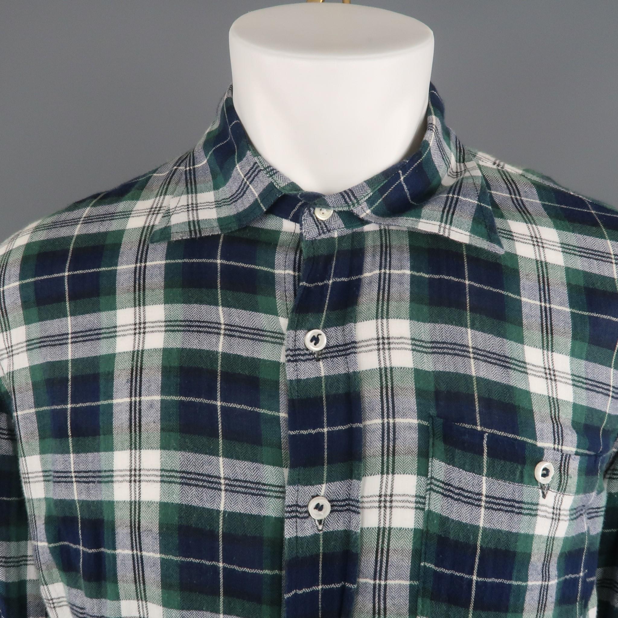 DSQUARED2 long sleeve shirt comes in a green and blue plaid featuring a spread collar and a front patch pocket.
 
Very Good Pre-Owned Condition.
Marked: IT 52
 
Measurements:
 
Shoulder: 19 in.
Chest: 46 in.
Sleeve: 27 in.
Length: 25 in.
SKU: