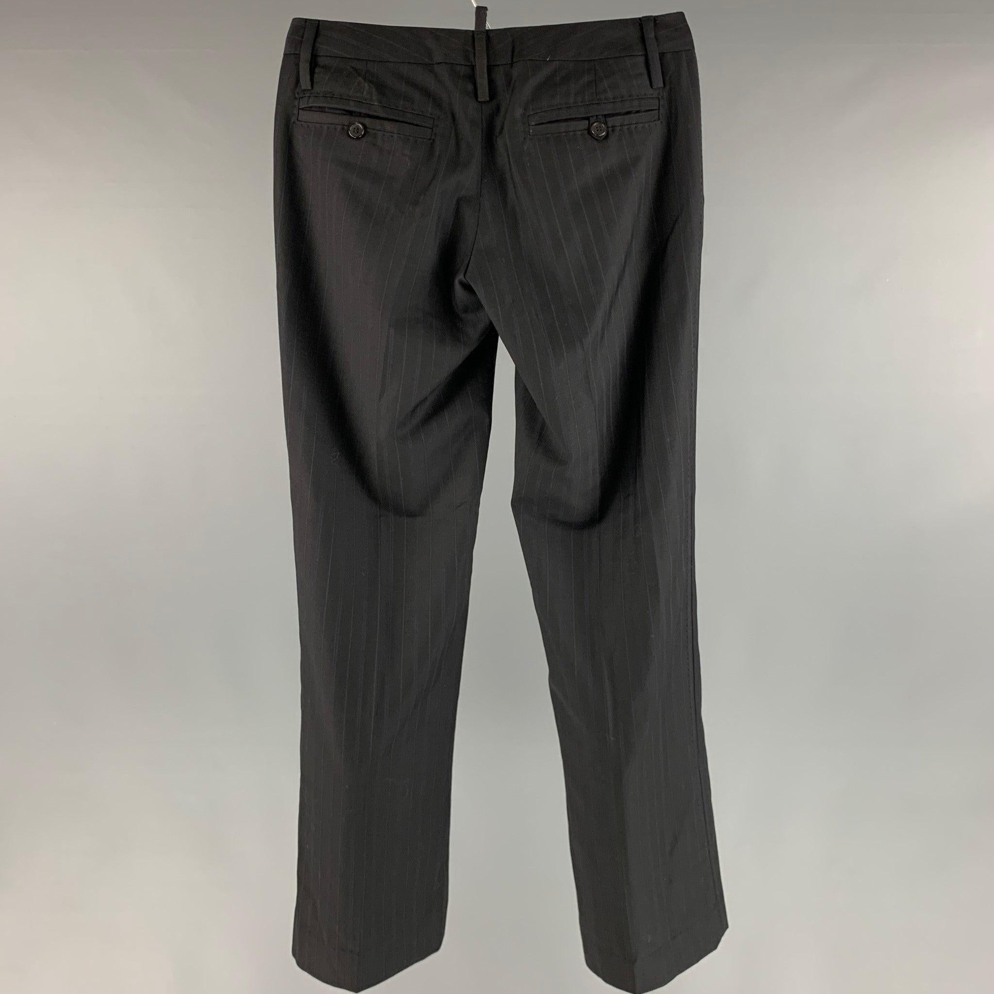 DSQUARED2 dress pants comes in black and navy wool stripped woven material featuring a low waist, and a zip up fly closure. Made in Italy.Very Good Pre-Owned Condition. 

Marked:  6 

Measurements: 
 Waist: 32 inches Rise: 5.5 inches Inseam: 31
