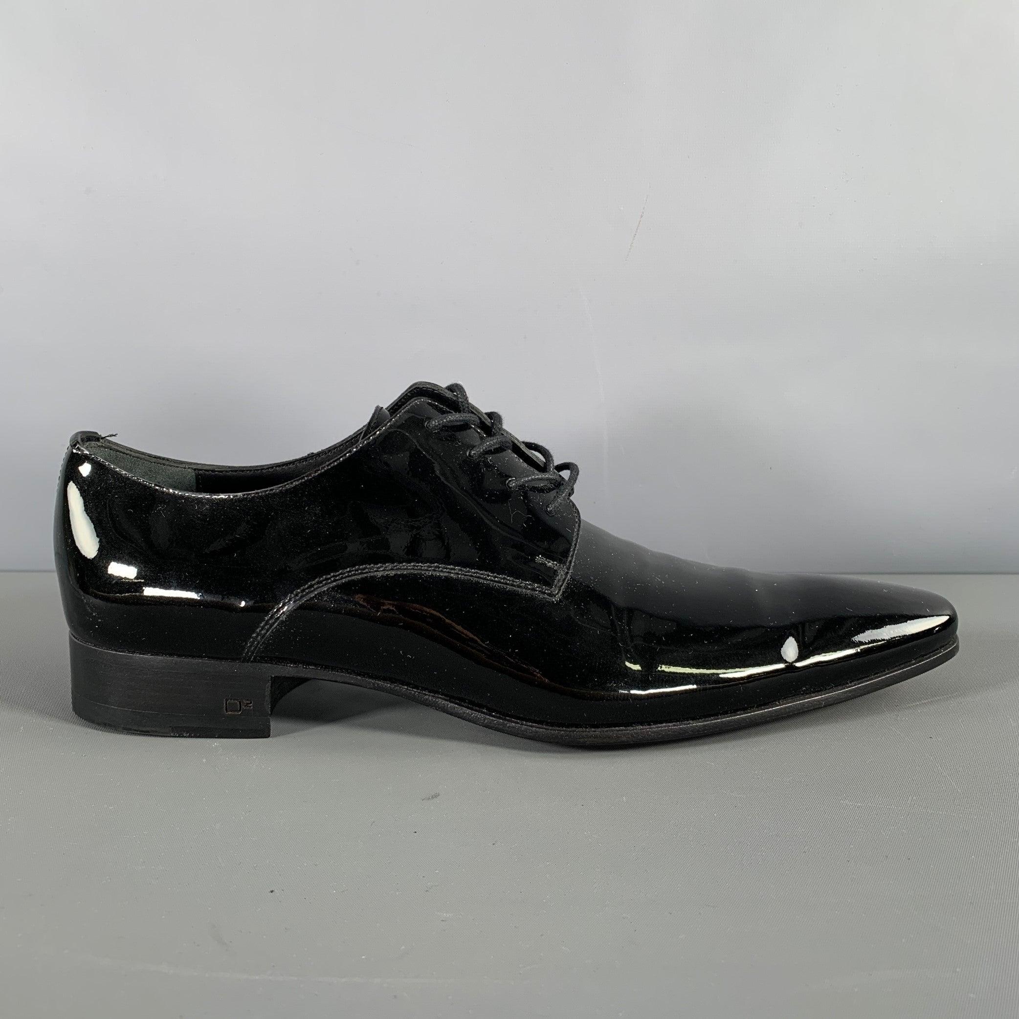 DSQUARED2 dress shoes come in black patent leather with a pointed toe and lace up front. With box. Made in Italy.Excellent Pre-Owned Condition. 

Marked:   42 1/2Outsole: 12.5 x 4 inches 
  
  
 
Sui Generis Reference: 130682
Category: Lace Up