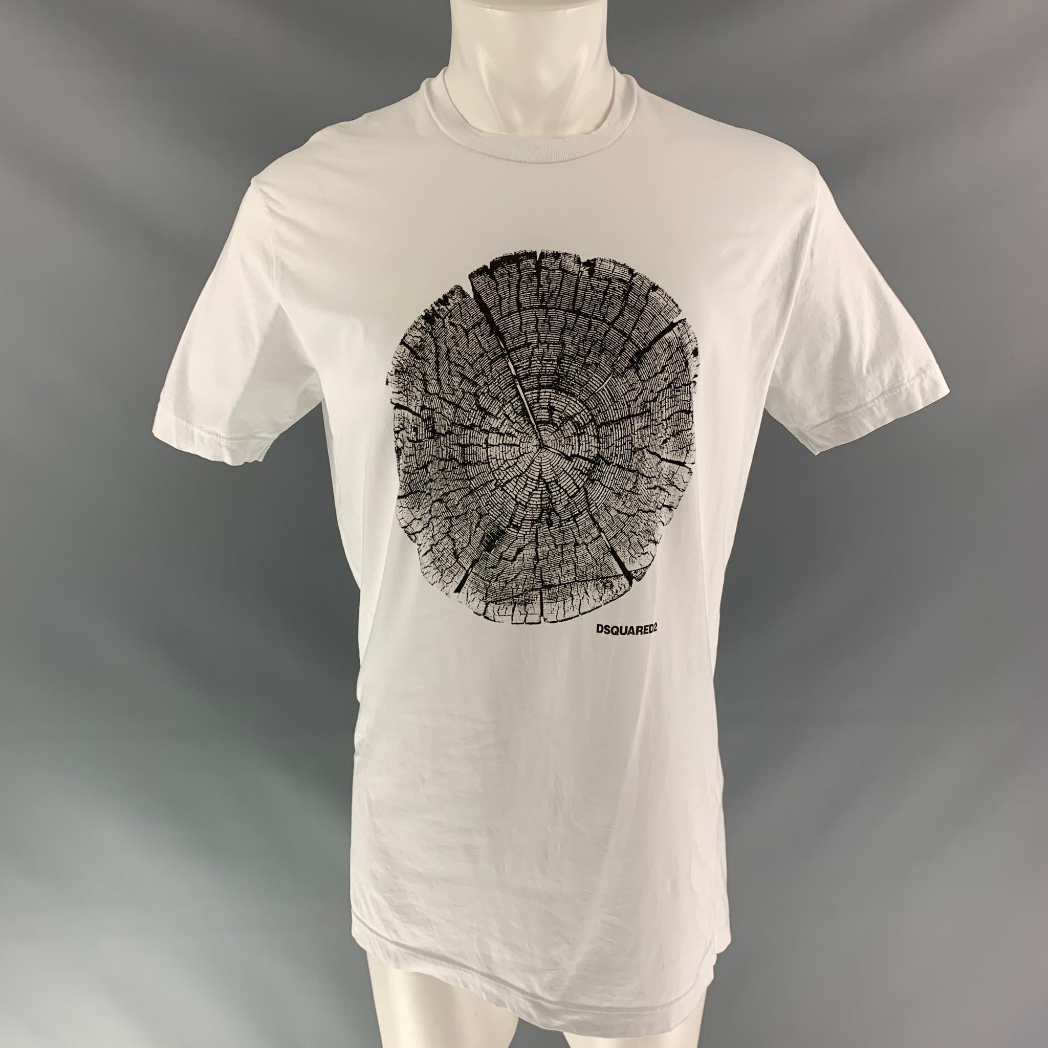 DSQUARED2 short sleeve t-shirt comes in white cotton, black and grey tree trunk graphic art at center front and a round collar. Made in Italy.

New with Tag.
Marked: L

Measurements:

Shoulder: 19 in
Chest: 45 in
Sleeve: 9 in
Length: 31 in