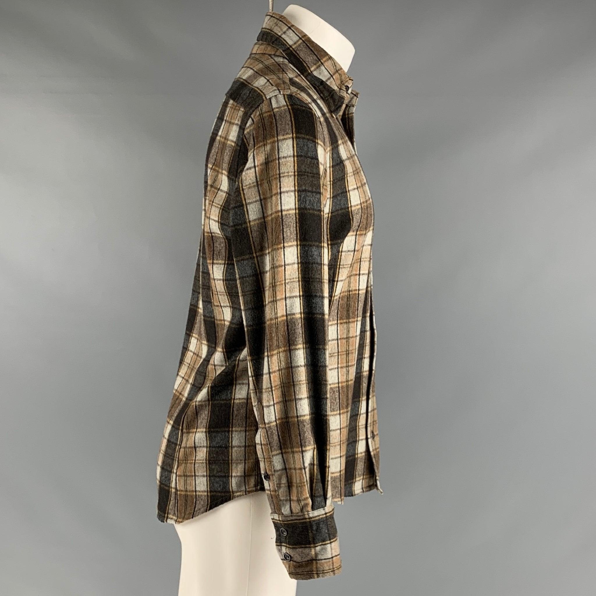 DSQUARED2 long sleeve shirt comes in a brown and beige plaid wool/polyester woven material featuring spread collar, and a button up closure. Made in Italy. Good Pre-Owned Condition. 

Marked:   50 

Measurements: 
 
Shoulder: 17.5 inches Chest: 44