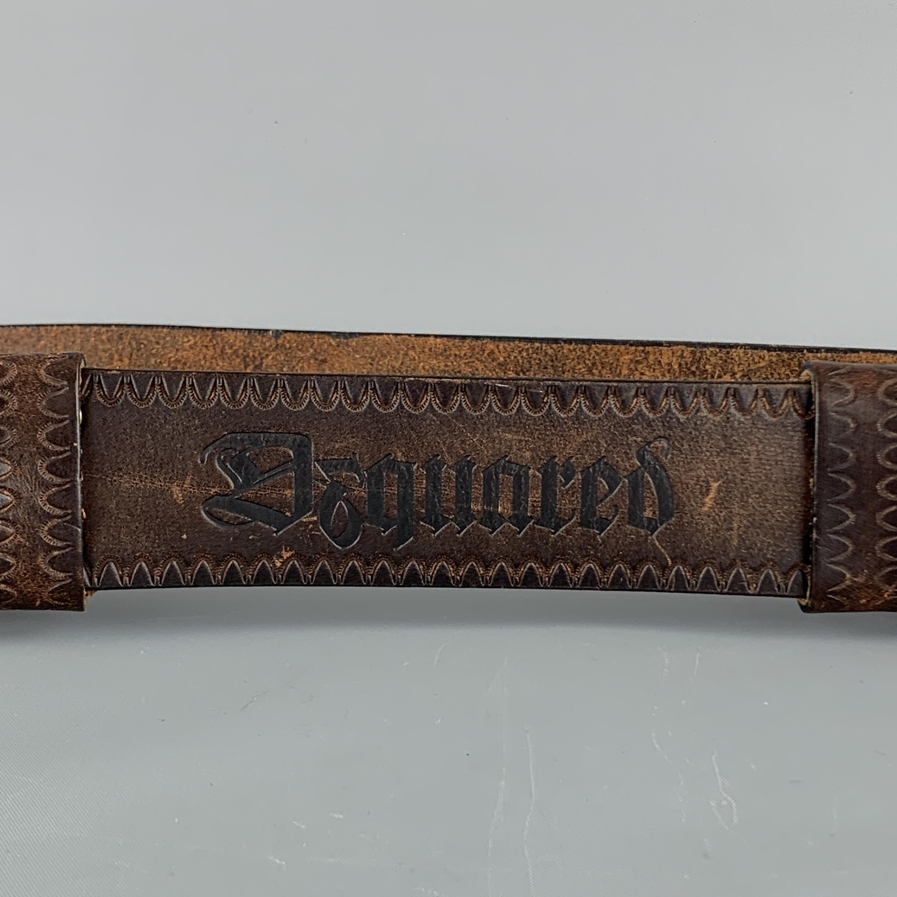 DSQUARED2 belt features a brown distressed leather strap with double loop adjustable double loop closures and embossed trim and logo. Made in Italy.

Very Good Pre-Owned Condition.
Marked: M

Width: 1.75 in.
Maximum Fit: 38.5 in.