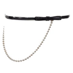 DSQUARED2 Vintage ceinture en cuir verni noir avec nœud et chaîne à boules argentées S