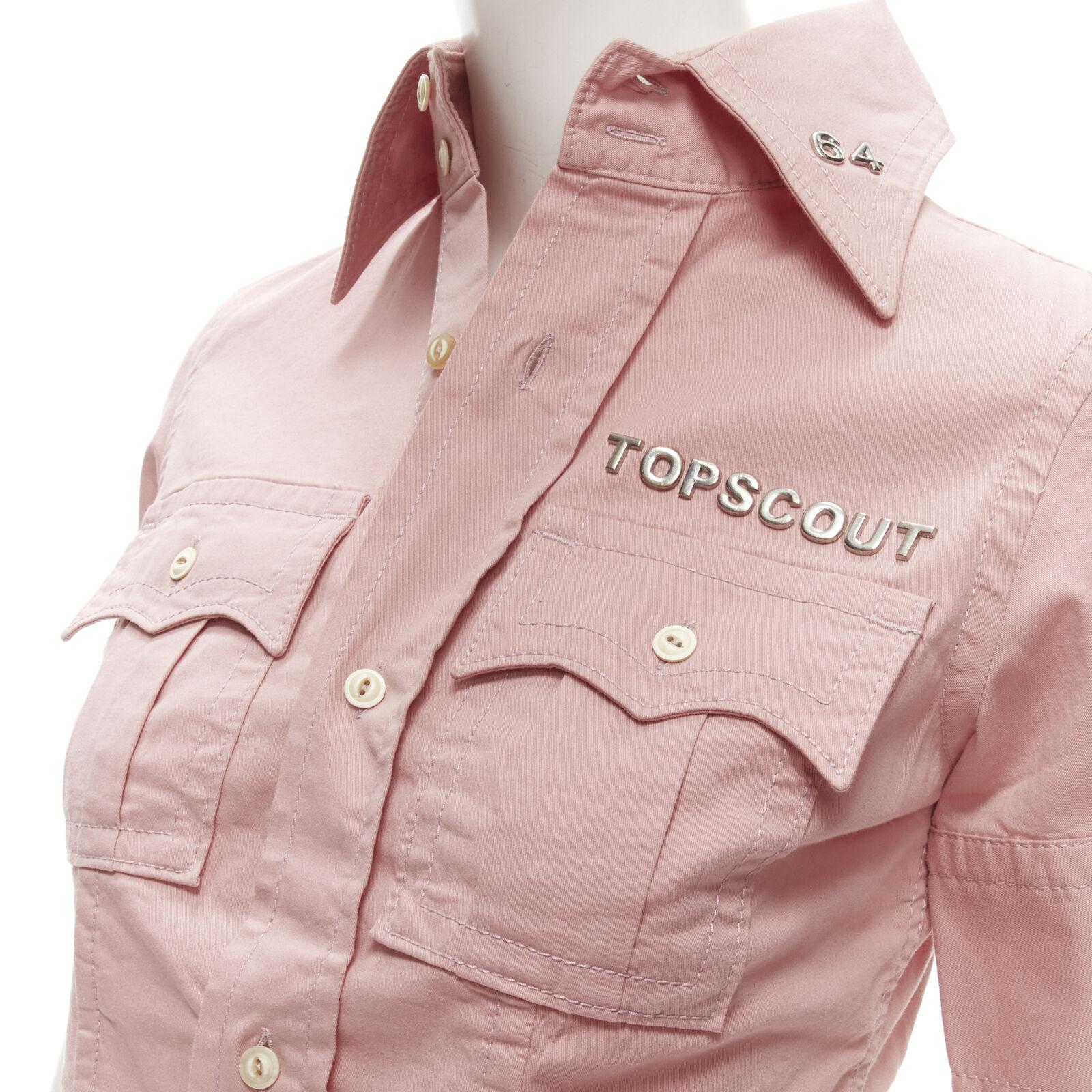 DSQUARED2 Vintage Topscout 1964 pink girl scout uniform shirt IT38 XS
Reference: ANWU/A01022
Brand: Dsquared2
Collection: Topscout
Material: Feels like cotton
Color: Pink, Silver
Pattern: Solid
Closure: Button
Extra Details: Silver-tone charm