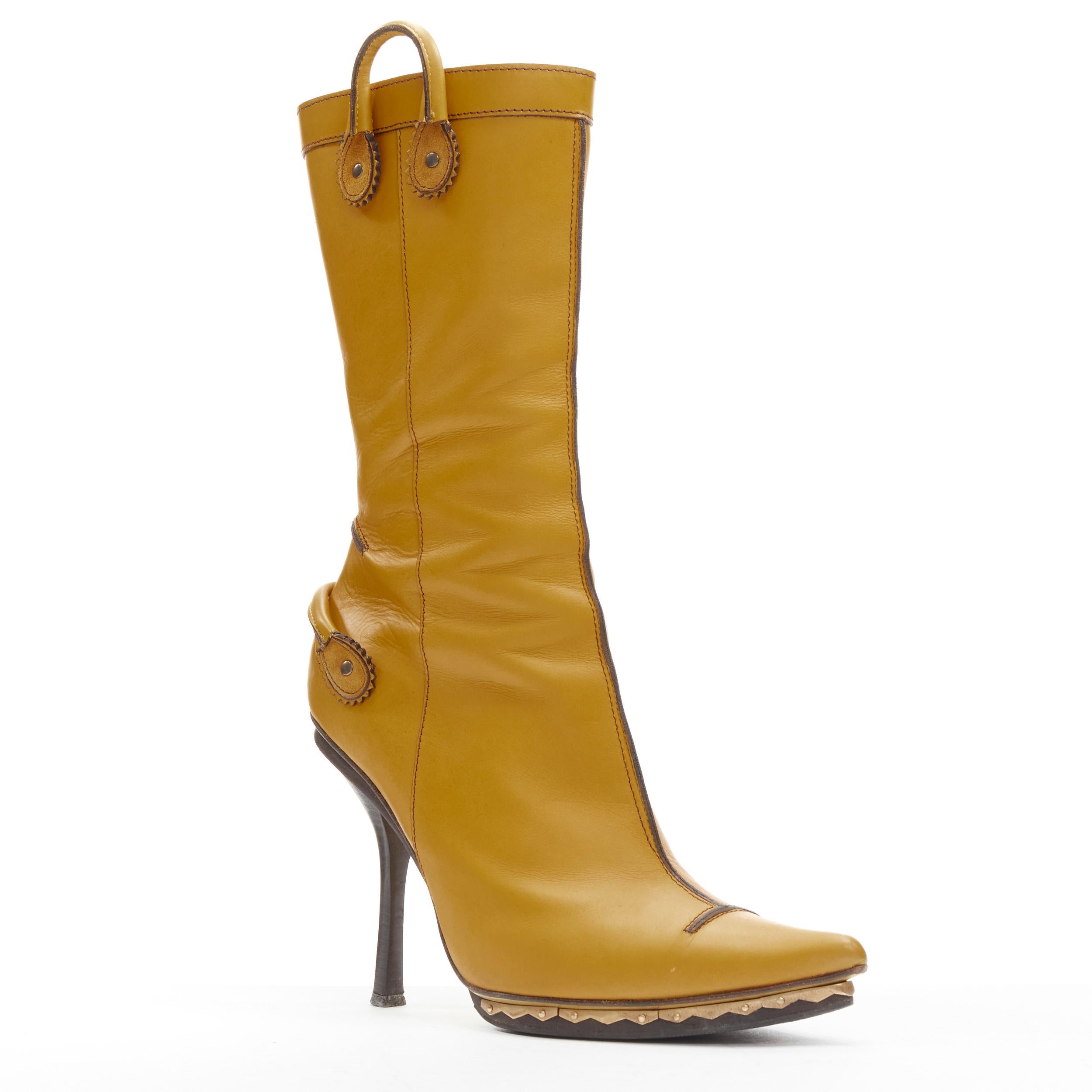 DSQUARED2 yellow leather loop handle gold metal trim platform tall boot EU36.5
Brand: Dsquared2
Material: Leather
Color: Yellow
Pattern: Solid
Closure: Zip
Extra Detail: Metal trim platform sold.
Made in: Italy

CONDITION:
Condition: Good, this item