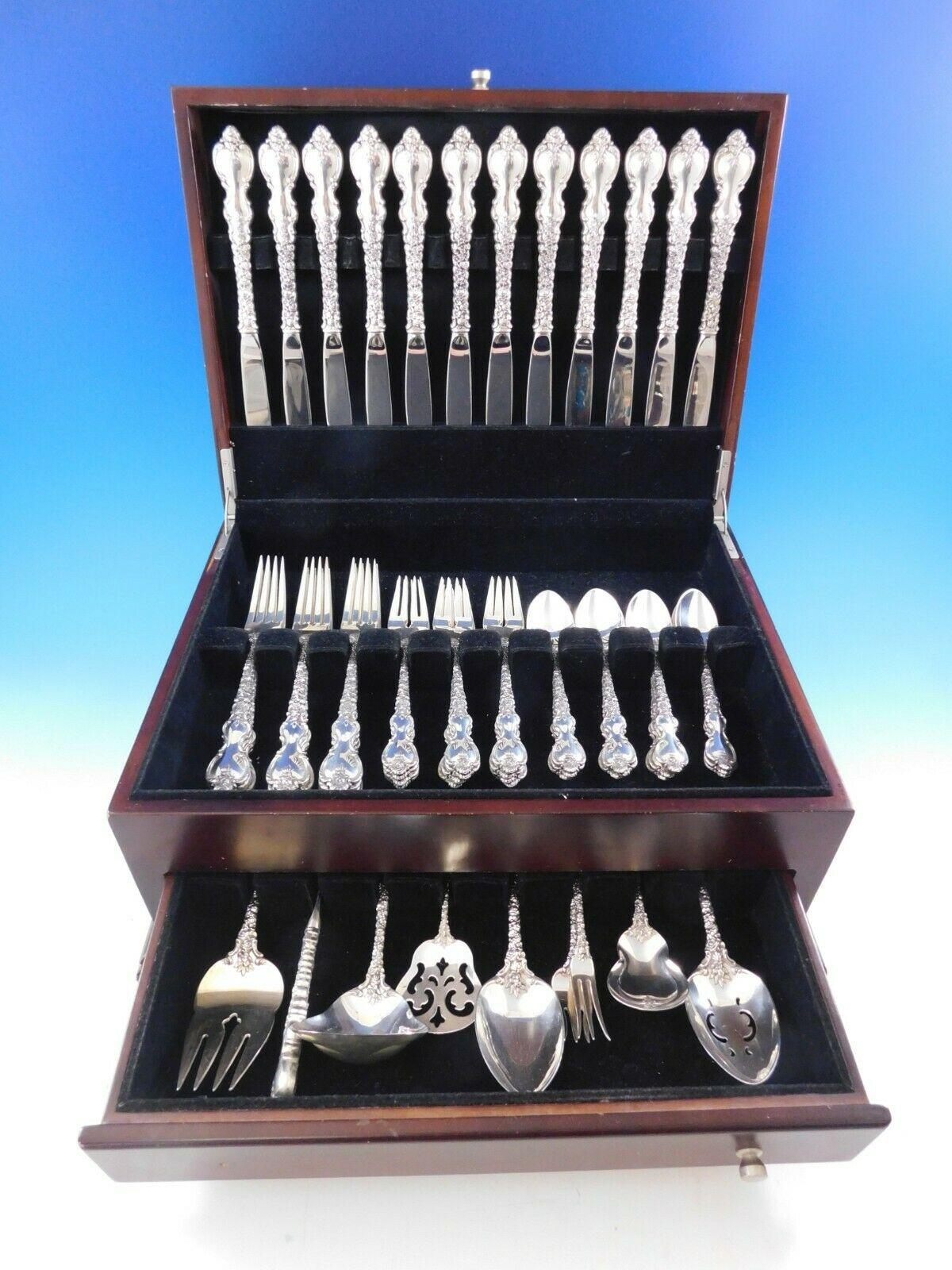 Gorgeous dinner size Du Barry by International sterling silver flatware set, 57 pieces. This set includes:

12 dinner knives, 9 3/4