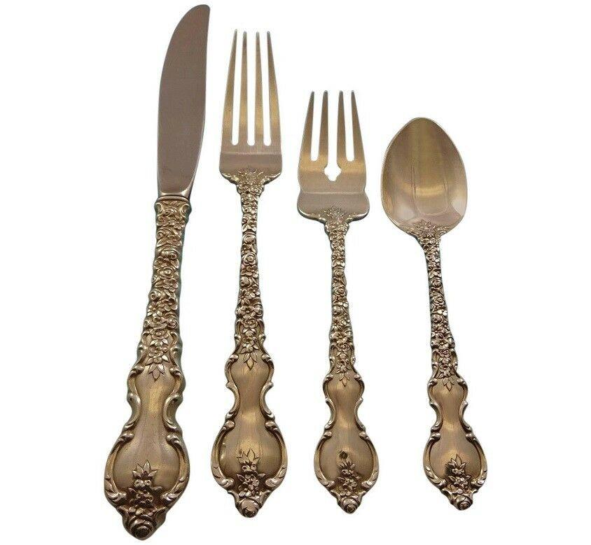 Exceptional dinner size Du Barry DuBarry by International sterling silver flatware set - 66 pieces. This set includes:

12 dinner size knives, 9 3/4