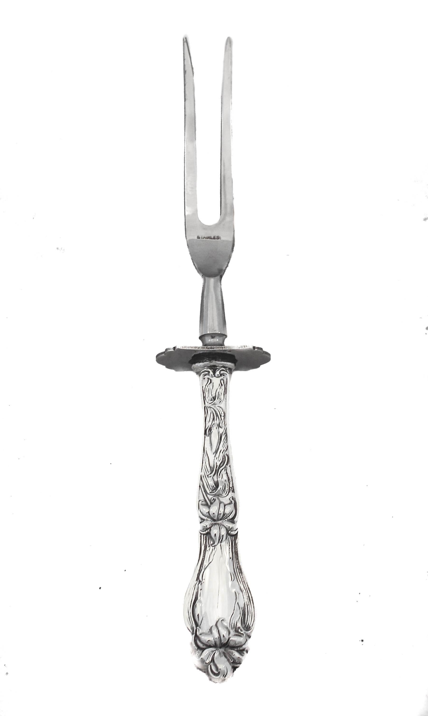 Offering a sterling silver carving fork and knife in the Du Barry pattern by International Silver. Just in time for the holiday season, a lovely carving set to dress up your holiday table. Garnish your gorgeous table with these lovely serving