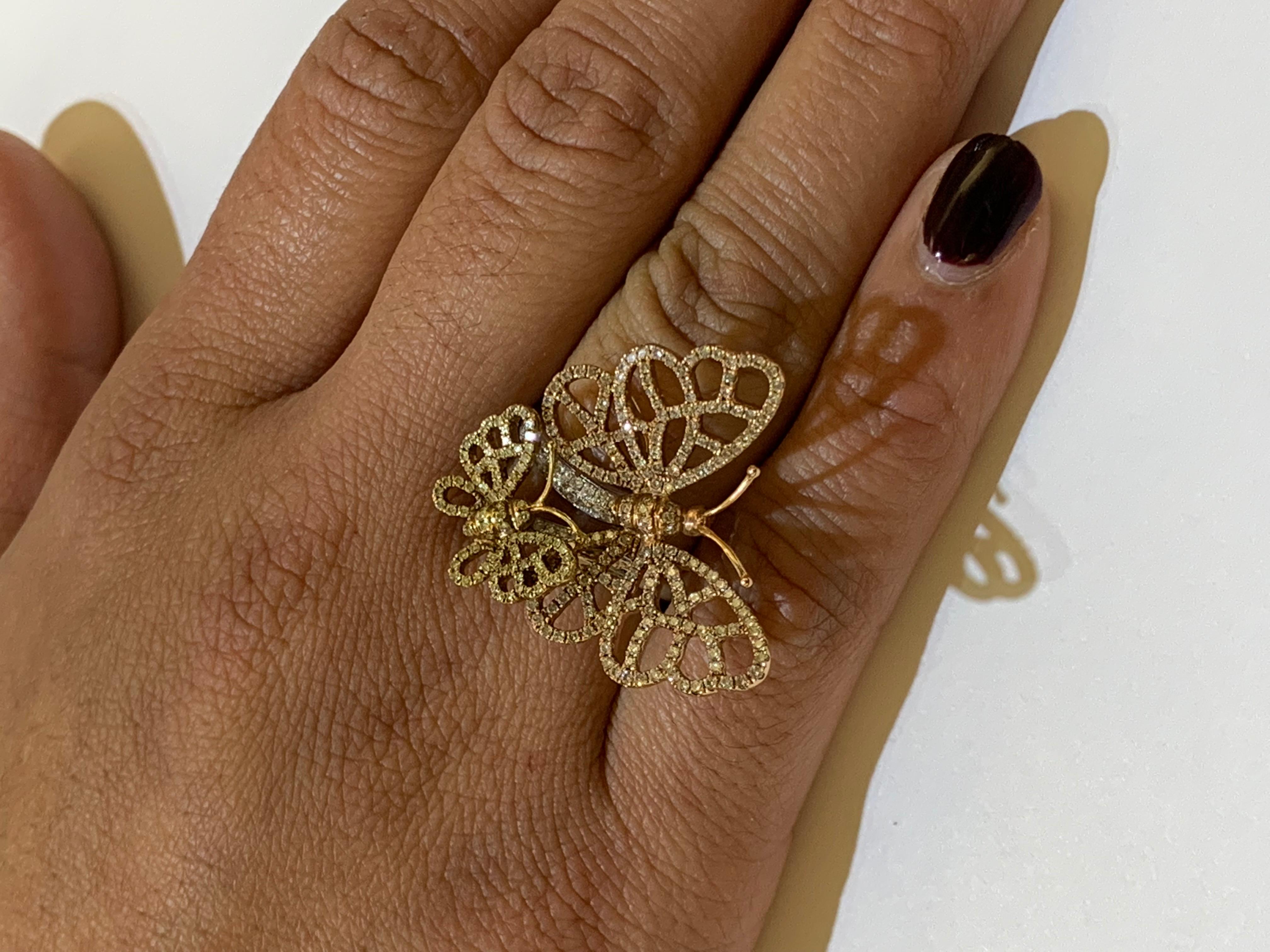 Beautiful dual butterfly ring with pave diamonds in 18K in tri color gold is super attractive. 

Ring Size: 7 ( can be sized )
18KT: 12.86g
Diamond: 1.51ct

