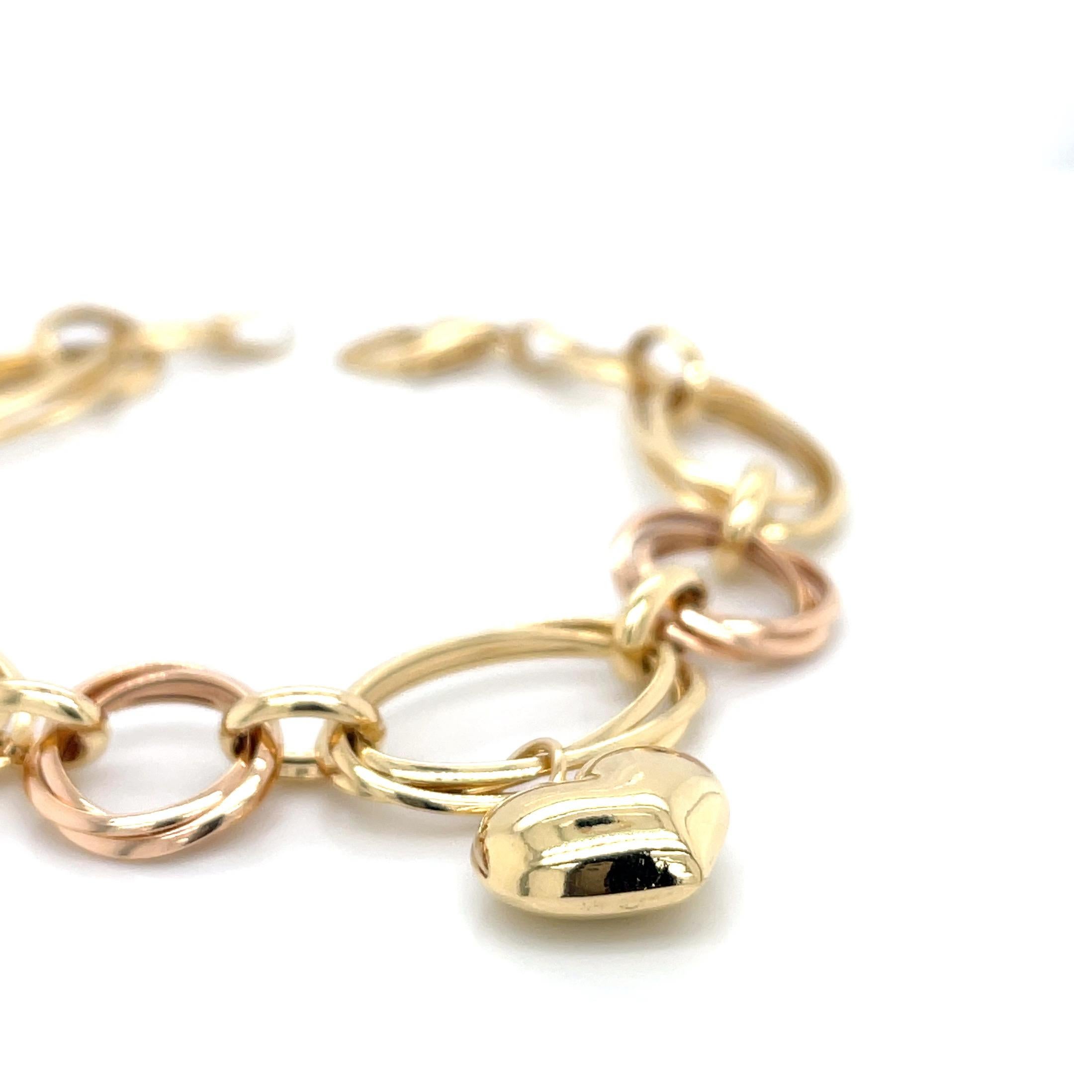 Modern Dual-Chain Heart Charm 18K Yellow & Rose Gold Bracelet For Sale