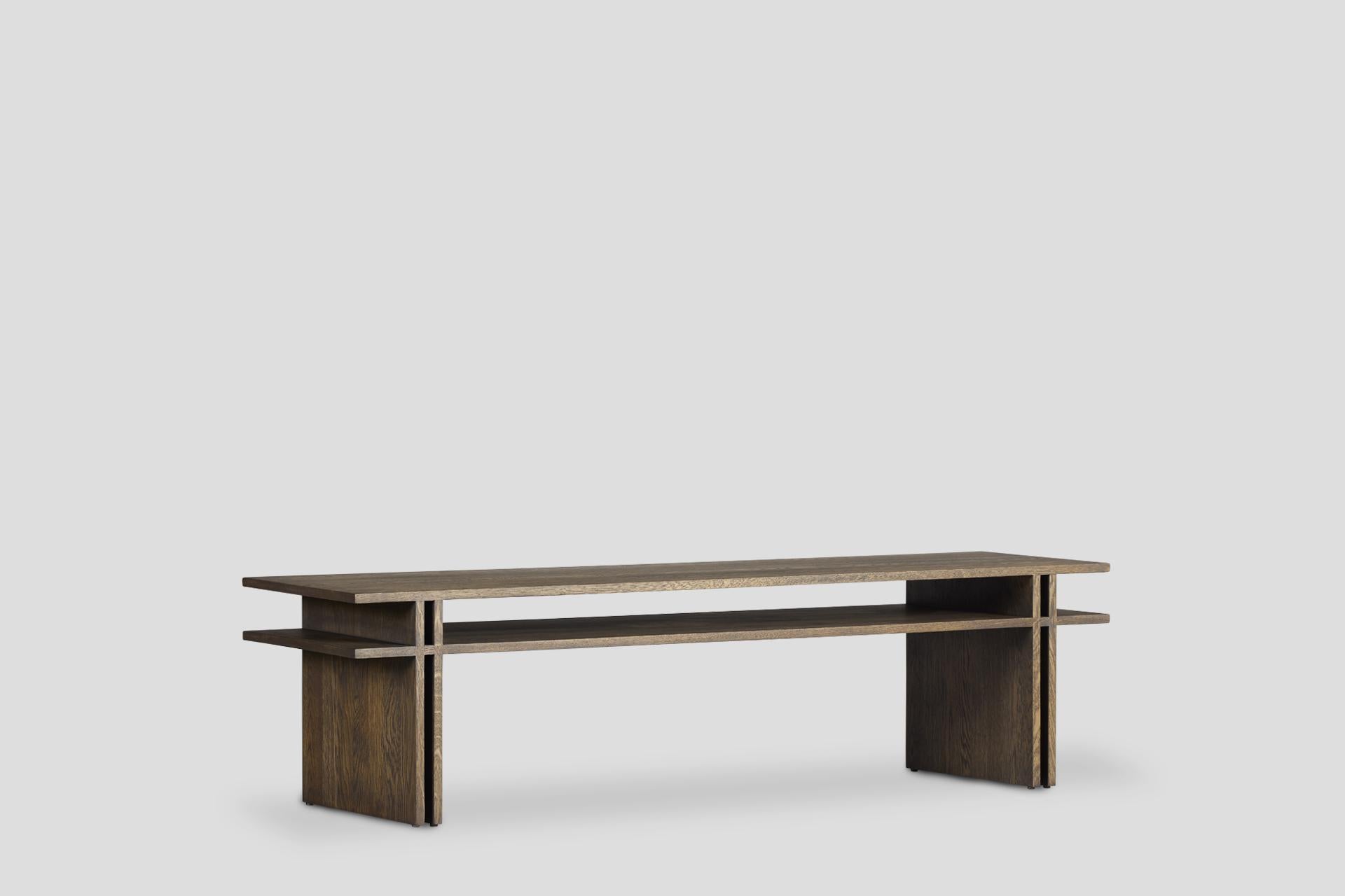 Dual Coffee Table draws attention with its simple and functional design. This design with Far Eastern influences brings together minimalism and naturalness. Produced with solid oak wood material, this coffee table stands out with its solid structure