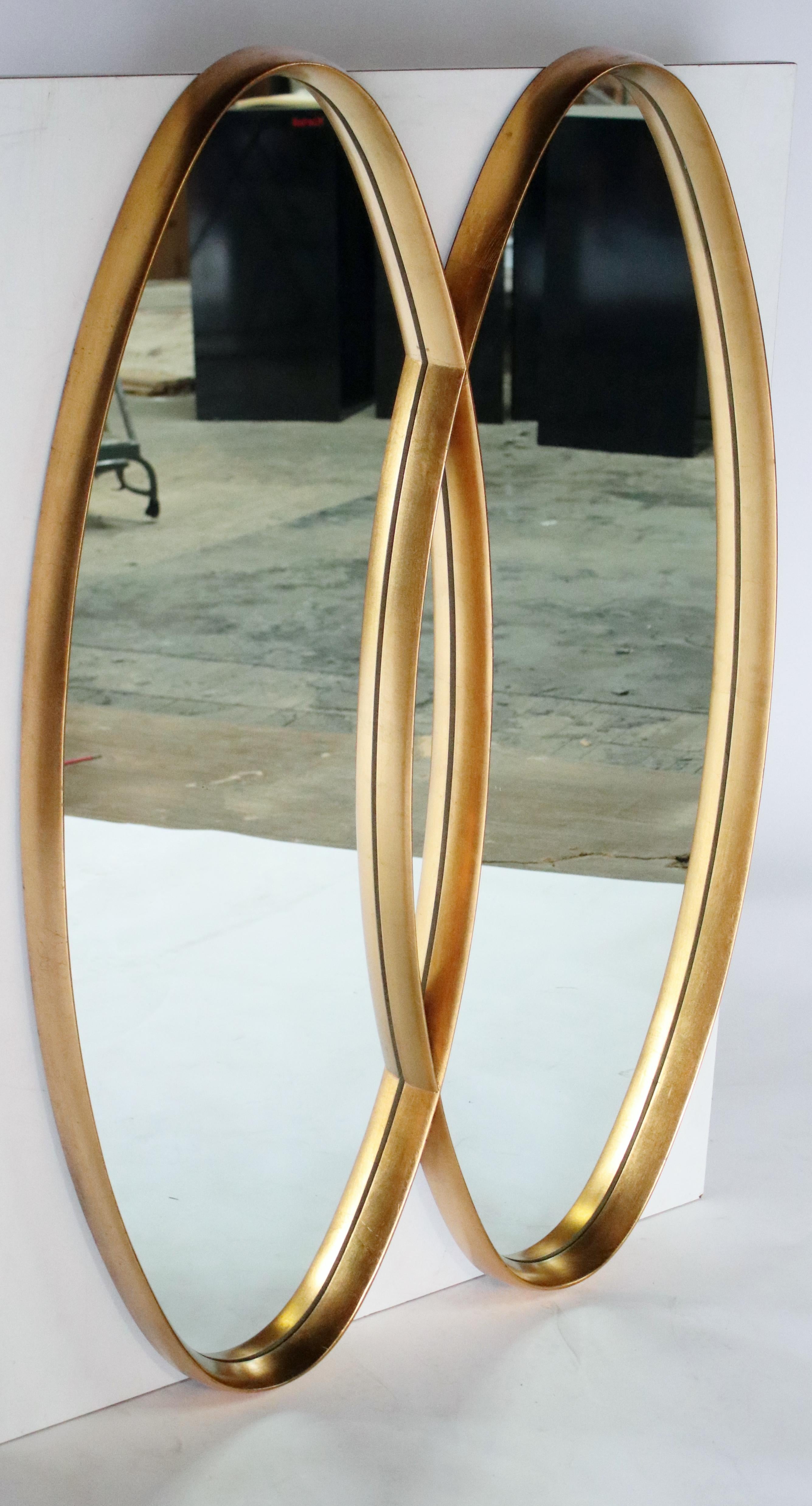 Midcentury Hollywood Regency mirror designed in an interlocking dual gold wood frame attributed to Labarge.