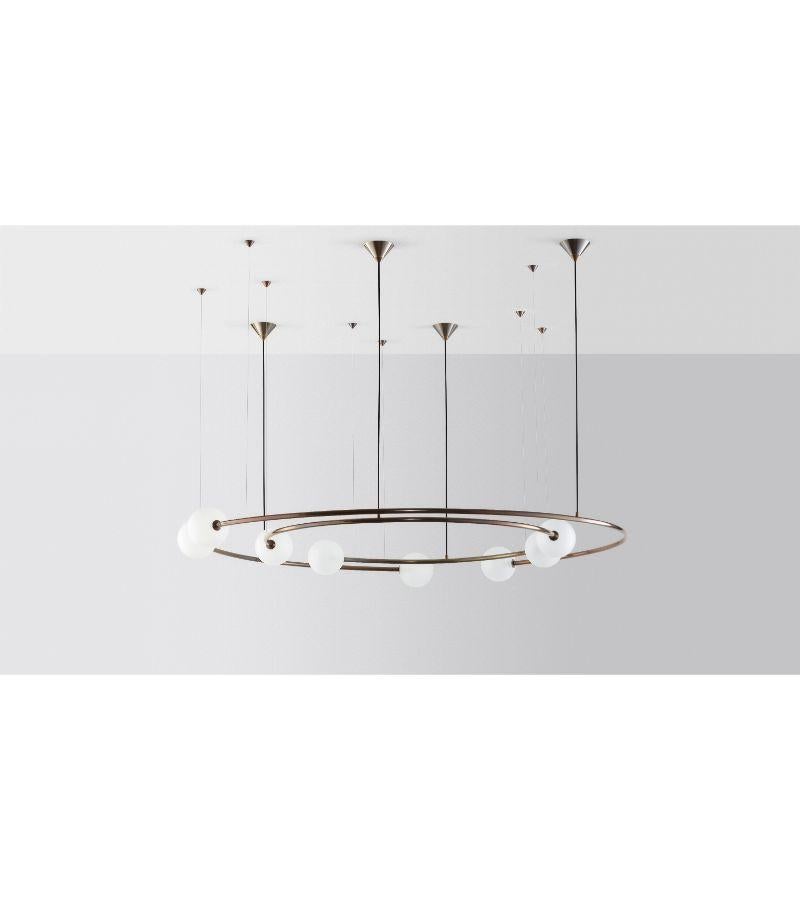 Dual Eing Oddments chandelier by Volker Haug
Dimensions: 
Inner ring: Diameter 110 cm 
Outter ring: Diameter 160 x height 40 cm 
Material: Brass. 
Finish: Polished, aged, brushed, bronzed, blackened, or plated
Cord: Black fabric
Light: : G9