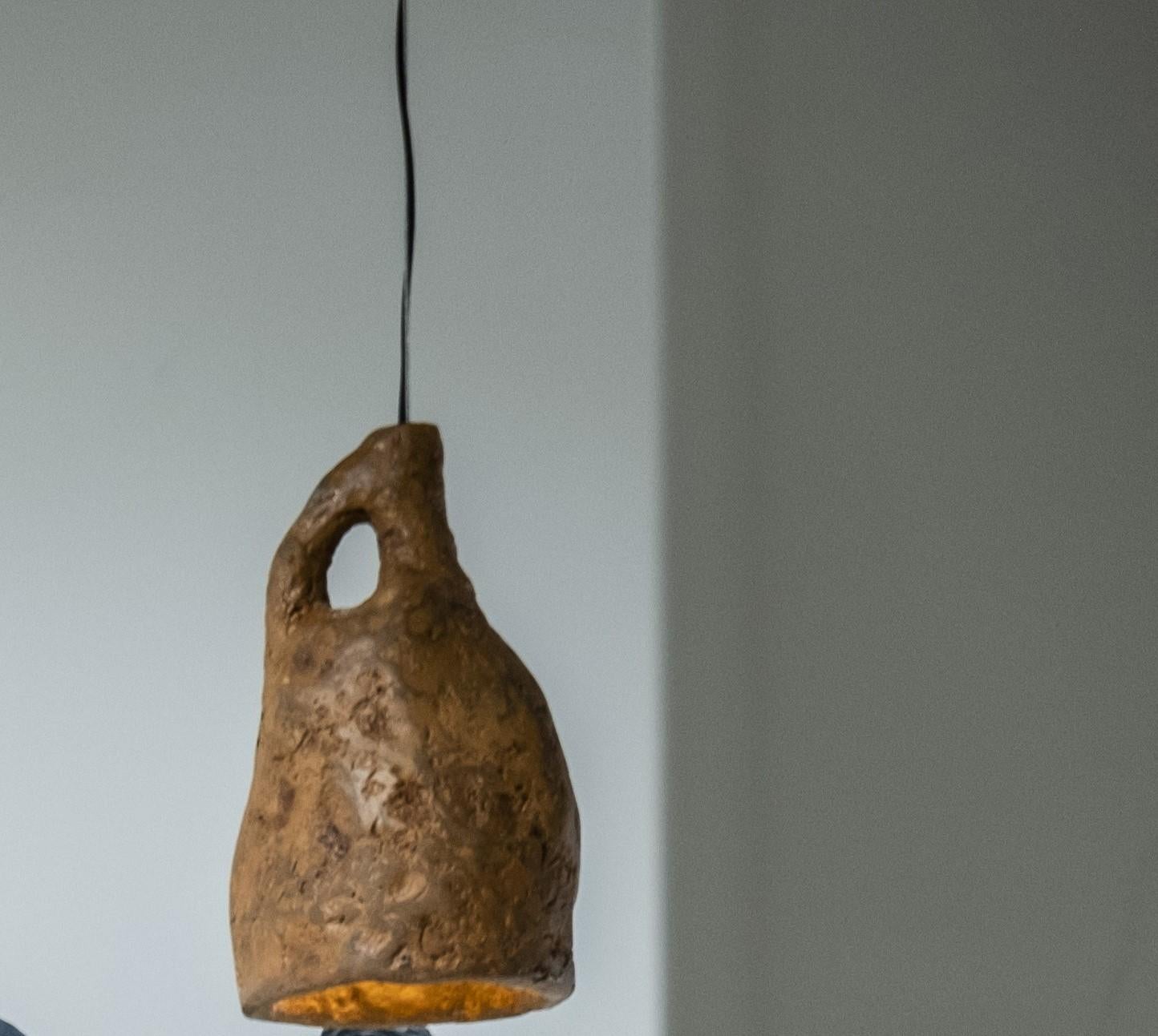 Dual Terra lamp by Willem Van Hooff
Dimensions: W 27 x D 27 x H 45 cm
Materials: Air Dry Clay

Willem van Hooff is a designer based in Eindhoven. He is a driven builder, were he likes to see design as his tool to express an remember stories. He