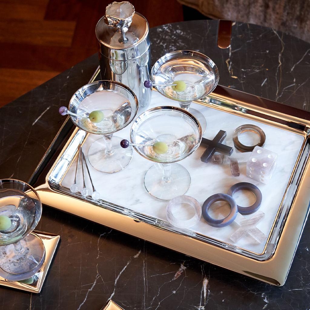 Our Dual Tray unites honed Italian Carrara marble, and polished nickel-plated metal, to create a design which is perfectly modern, and highly functional.  This design embodies our brand values of elevating nature through design.  Each tray is