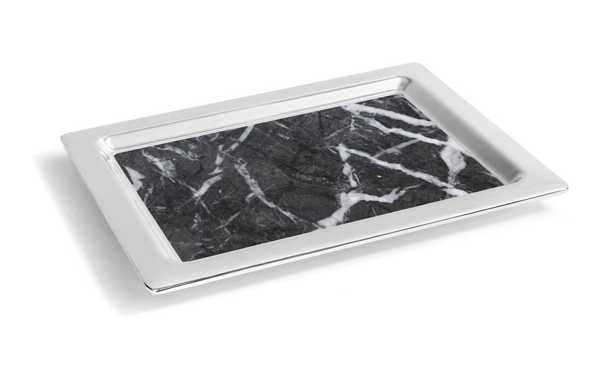 Our Dual Tray unites honed Italian Carnico marble and polished nickel-plated metal to create a design which is perfectly modern and highly functional.  This design embodies our brand values of elevating nature through design.  Each tray is crafted