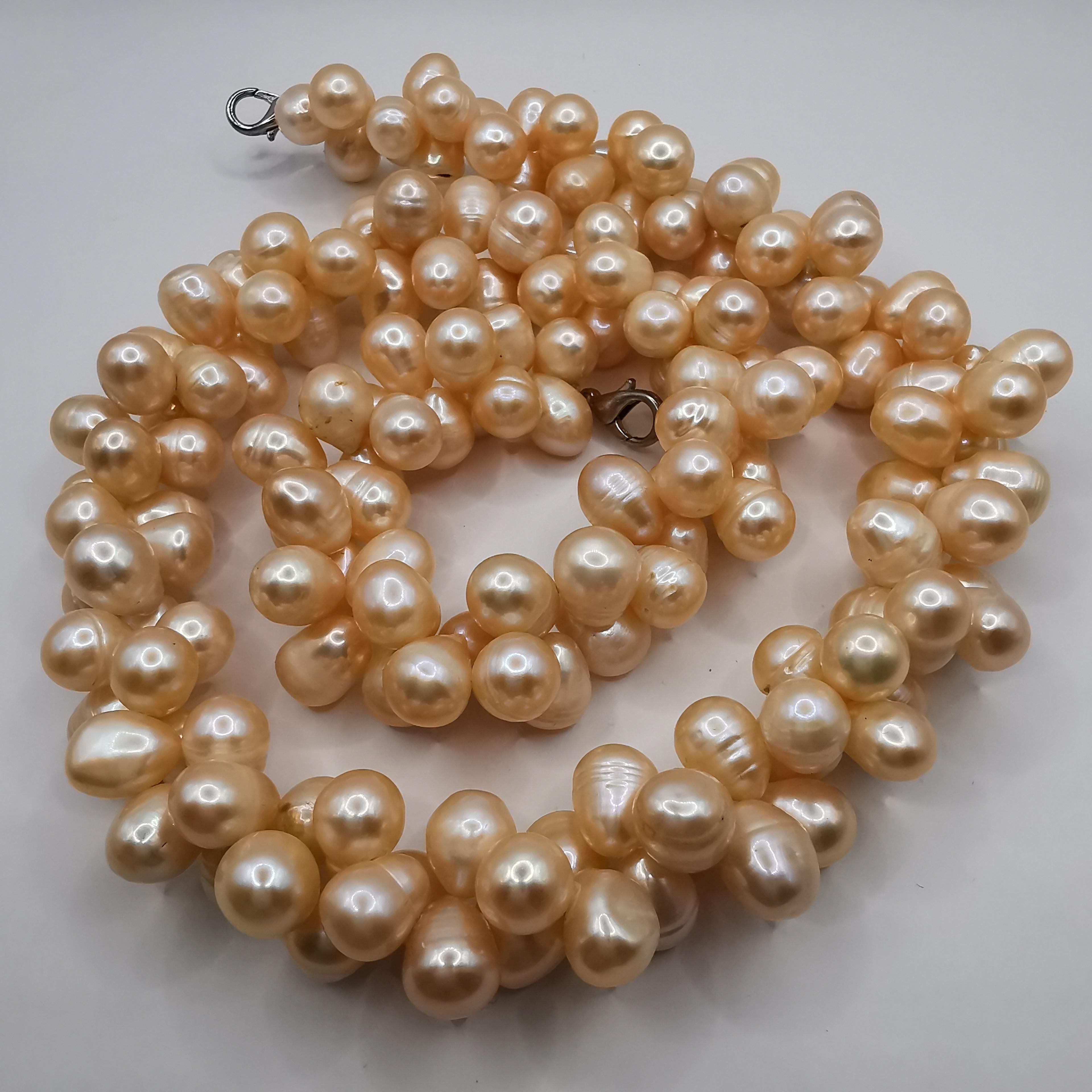 Uncut Dual Twisted Freshwater Cultured Baroque Peach Pearl Necklace For Sale