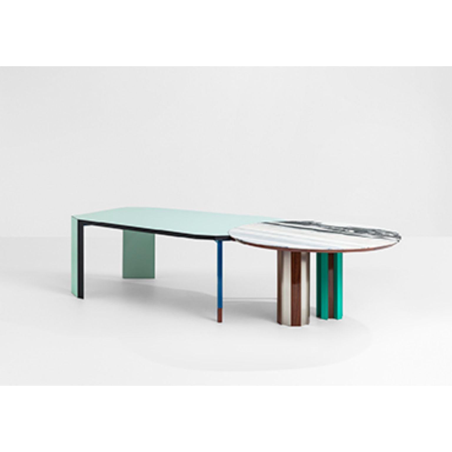 Duale table by SEM
Dimensions: W 310,5 x D 145,0 x H 75,0 cm
Round top Ø145,0 cm
Poligonal top W 186,0 x D 128,0 cm
Material:Round top - polished Lasa marble or Panda marble, Polygonal top - laminated MDF in light green colour, Legs - polished