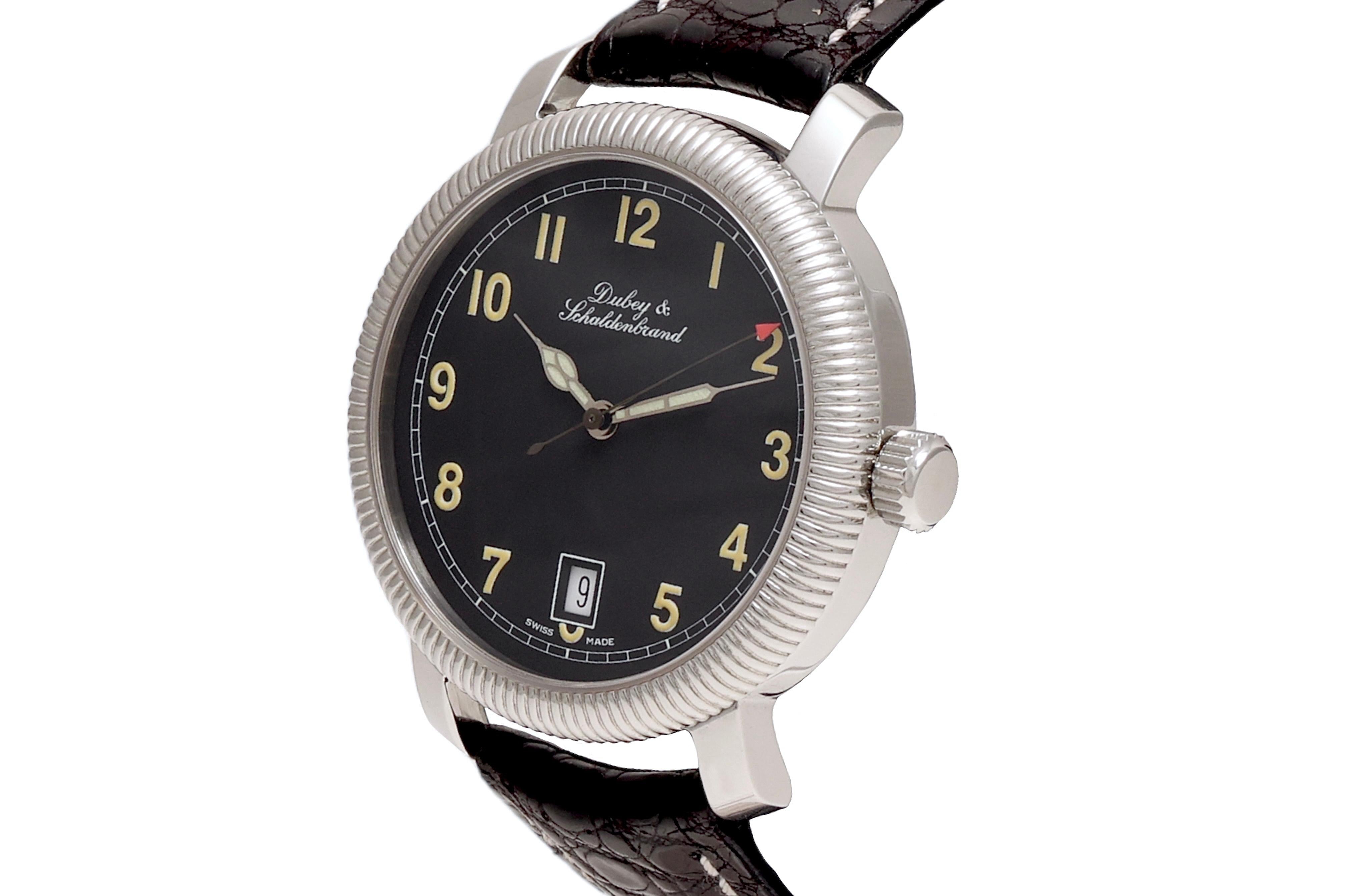 Dubey & Schaldenbrand Steel Wristwatch, Automatic, Swiss Made with Box and Warranty paper.

Movement: Swiss made automatic movement with viewable window of this on the rear of the watch

Case: Stainless steel case, diameter 38 mm x thickness 9.8